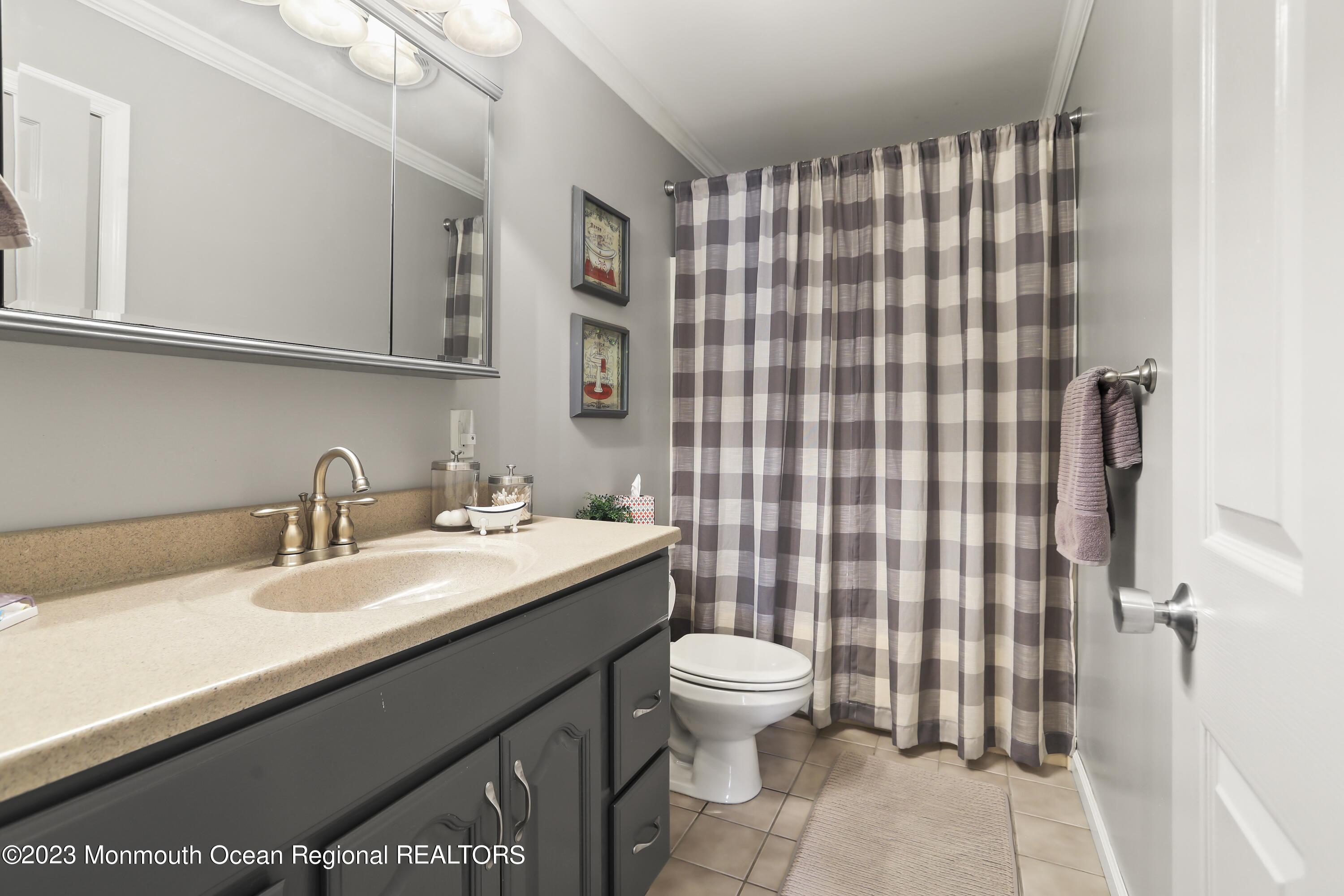 7 Burtina Place Keyport, NJ 07735 - Photo 24 of 29 a bathroom with a sink a toilet and shower
