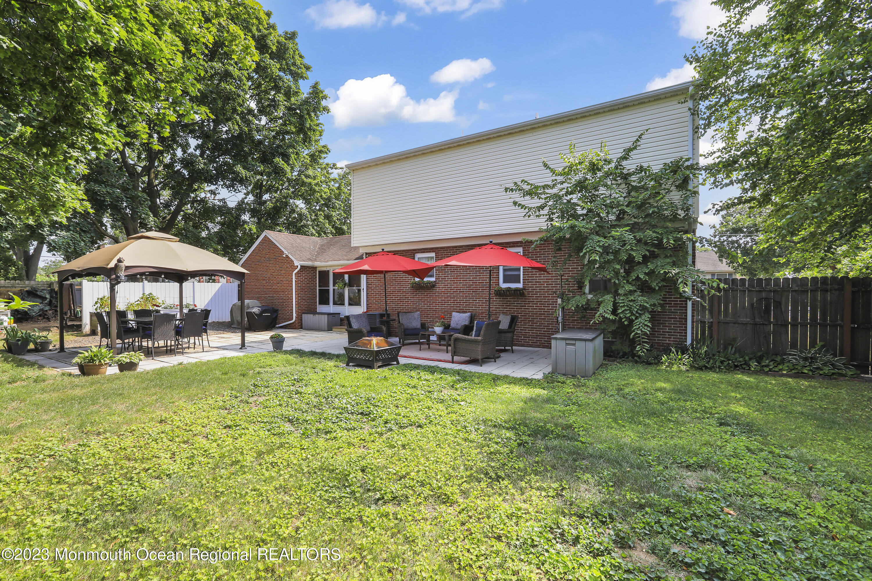 7 Burtina Place Keyport, NJ 07735 - Photo 25 of 29 a view of swimming pool with lawn chairs and potted plants