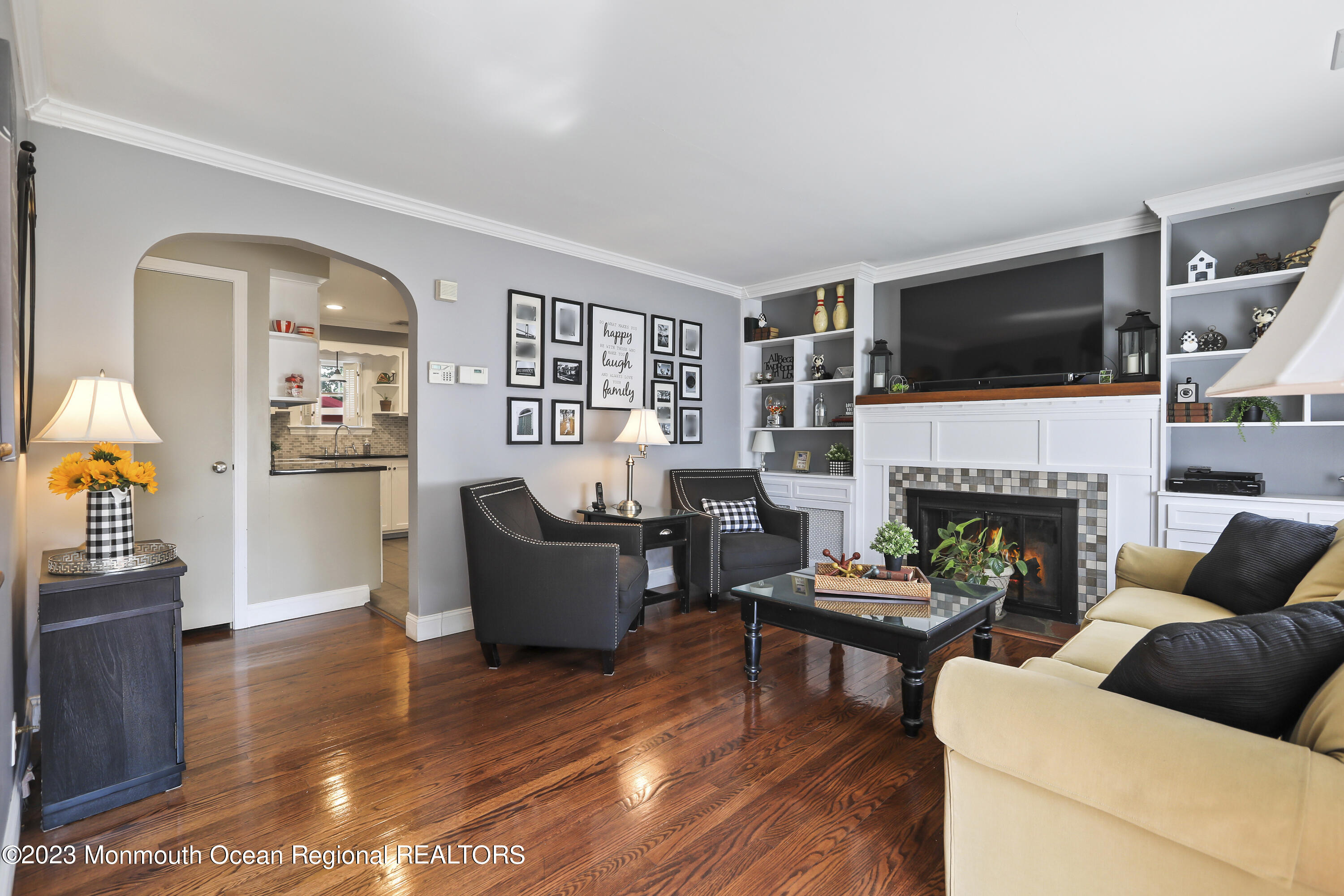 7 Burtina Place Keyport, NJ 07735 - Photo 5 of 29 a living room with furniture fireplace and flat screen tv