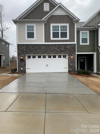 a view of a house with garage