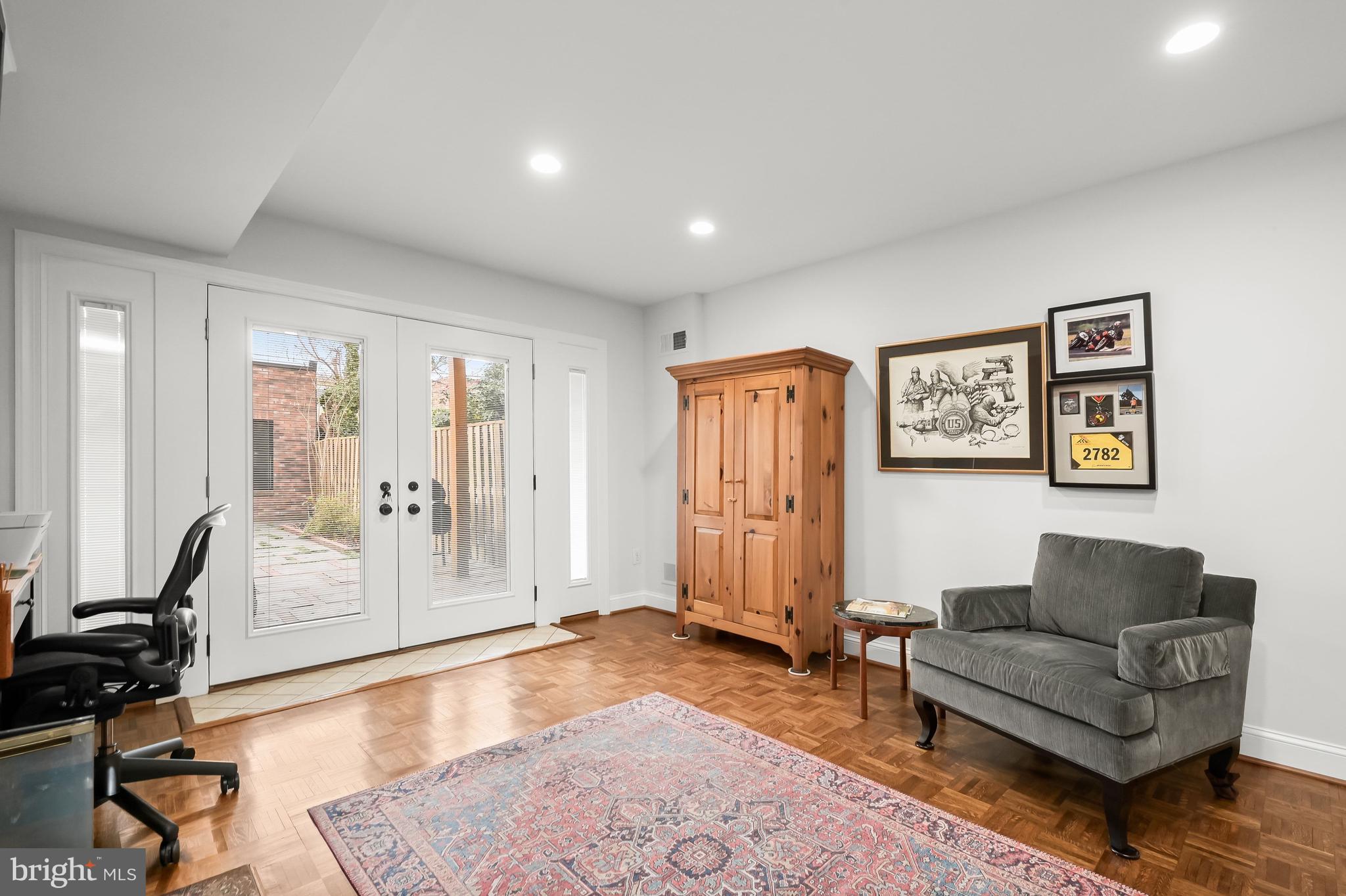 237 10th Street Southeast Washington, DC 20003 - Photo 24 of 40 a living room with furniture and a window