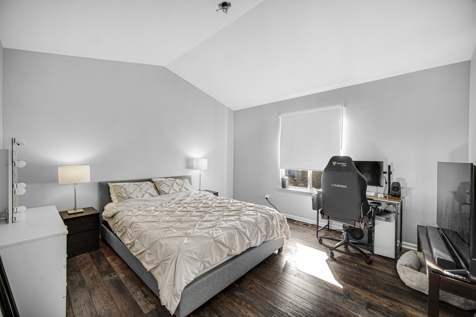 1741 Raleigh Trail Romeoville, IL 60446 - Photo 18 of 20 a bedroom with a bed and wooden floor