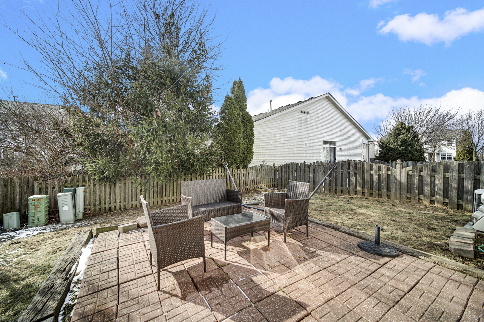 1741 Raleigh Trail Romeoville, IL 60446 - Photo 5 of 20 a view of a patio with a table and chairs