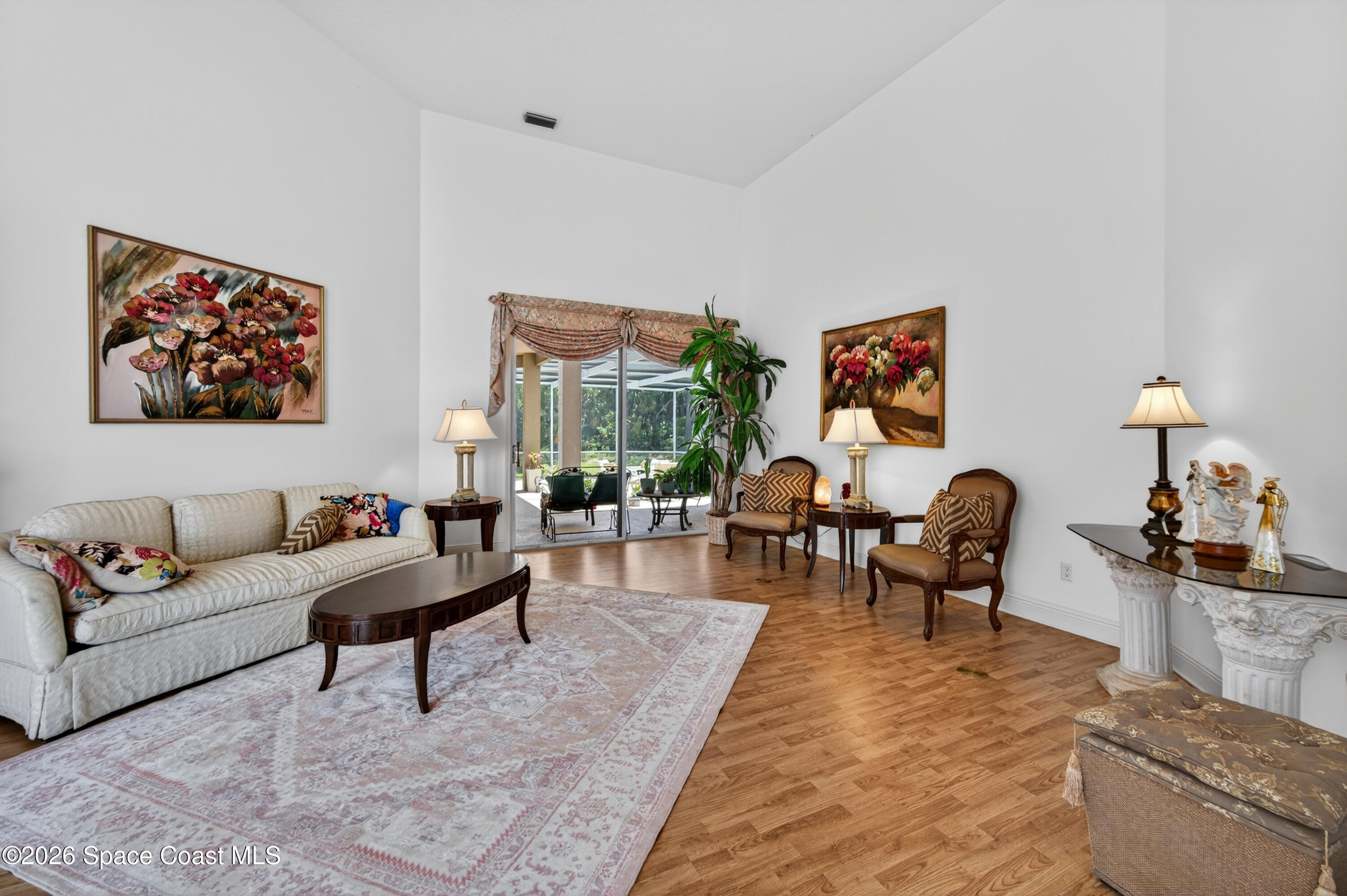 900 Bluegrass Lane Rockledge, FL 32955 - Photo 15 of 73 Formal Living Opens to Lanai