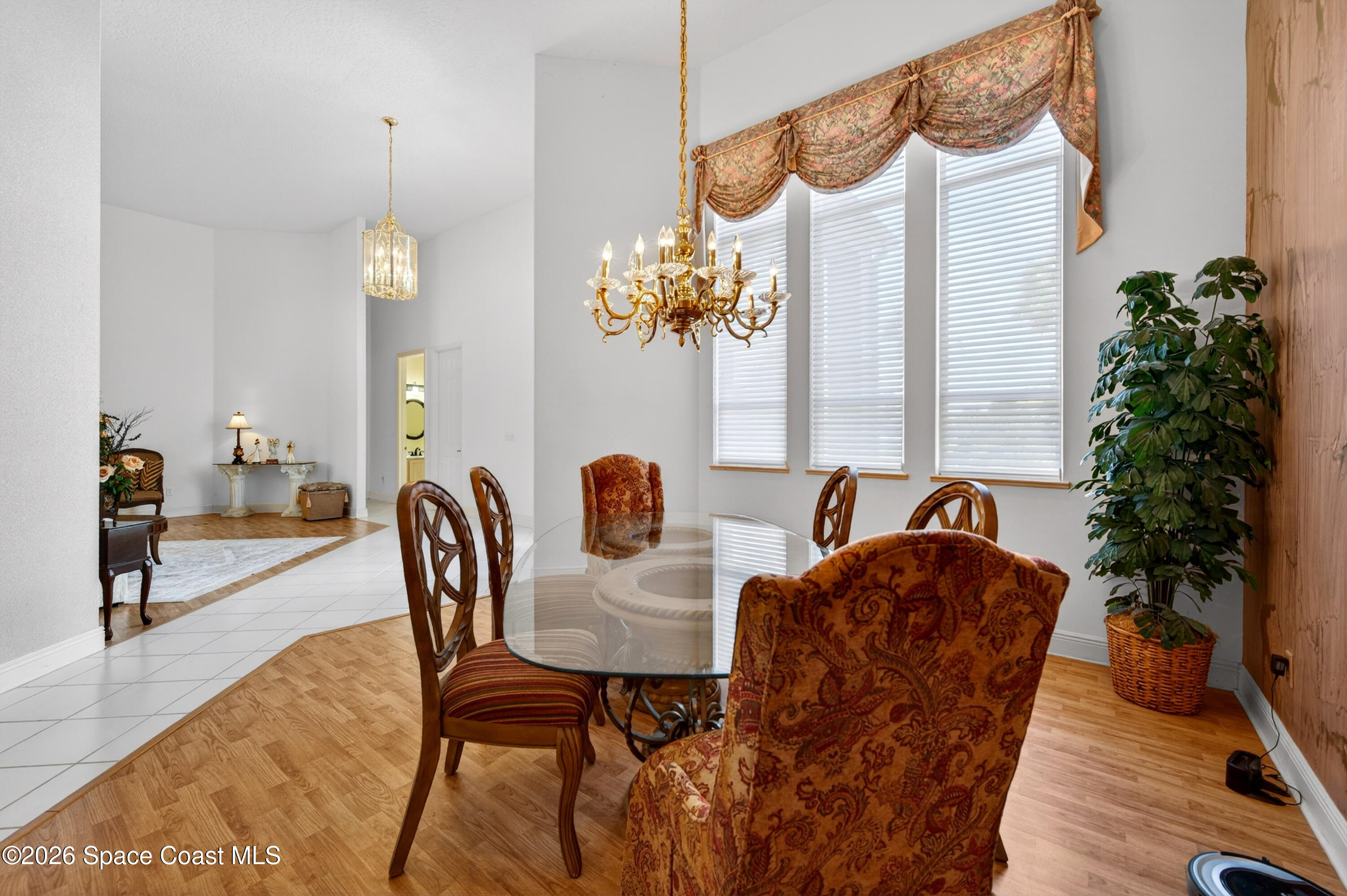 900 Bluegrass Lane Rockledge, FL 32955 - Photo 20 of 73 Formal Dining Opens to Formal Living