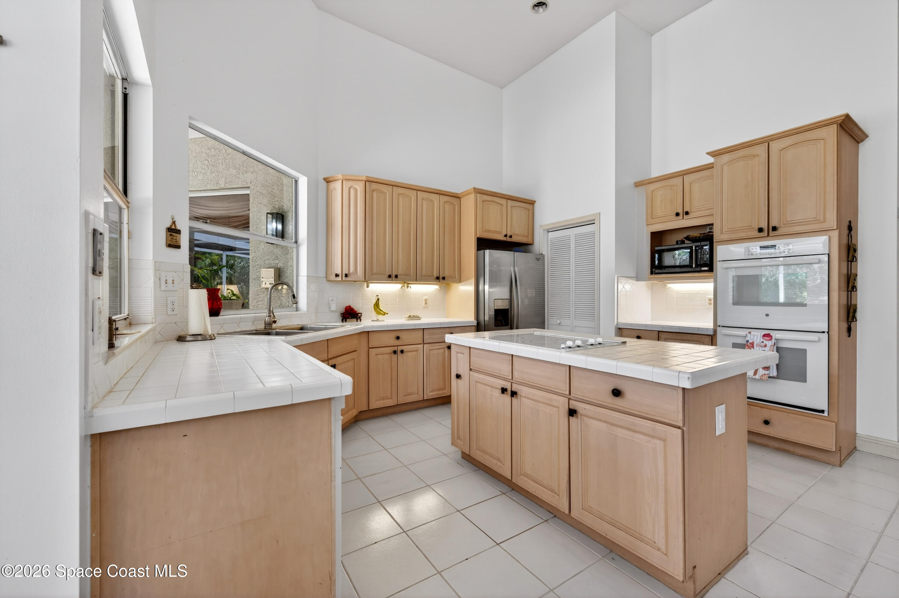 900 Bluegrass Lane Rockledge, FL 32955 - Photo 23 of 73 Kitchen Island