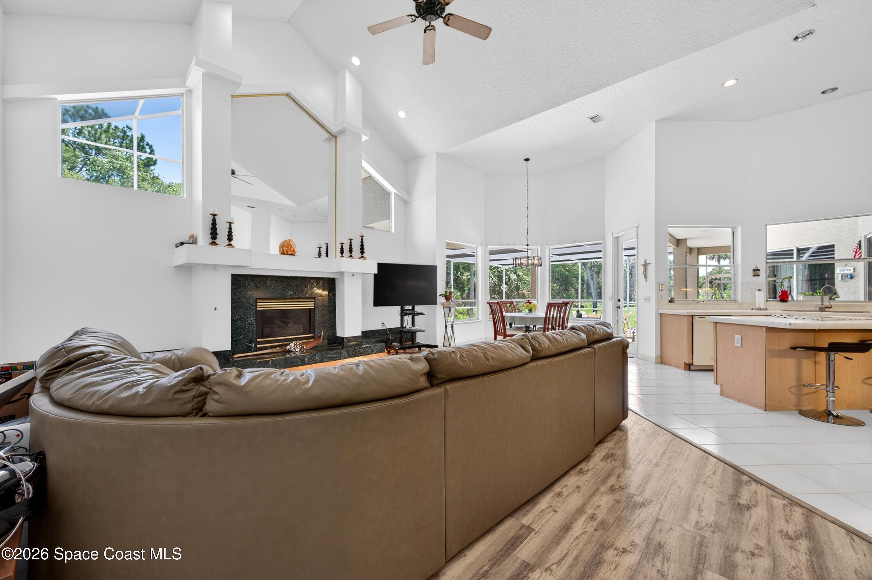900 Bluegrass Lane Rockledge, FL 32955 - Photo 28 of 73 Volumous Family Room Ceilings