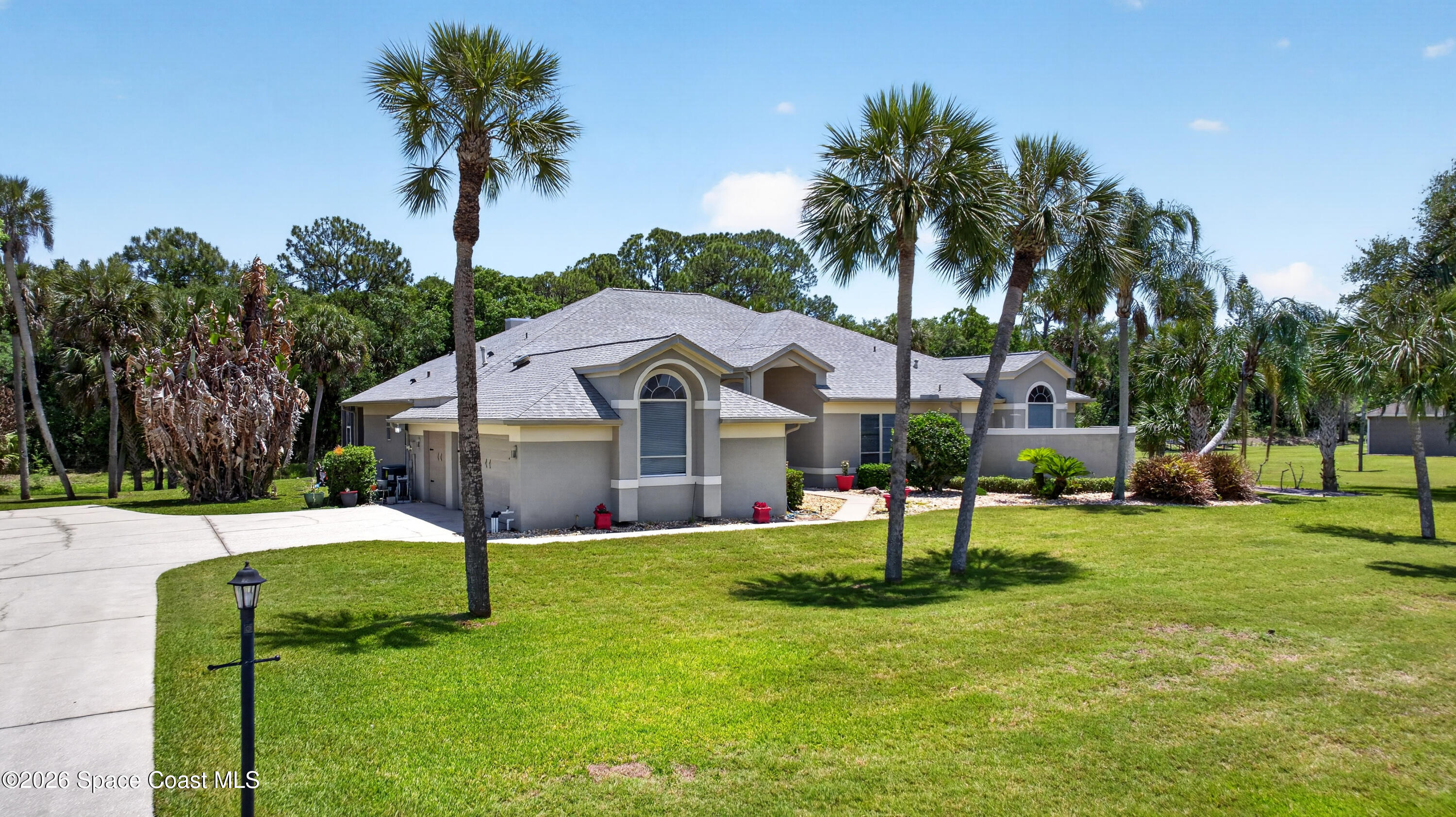900 Bluegrass Lane Rockledge, FL 32955 - Photo 3 of 73 DJI_20260428140721_0007_D