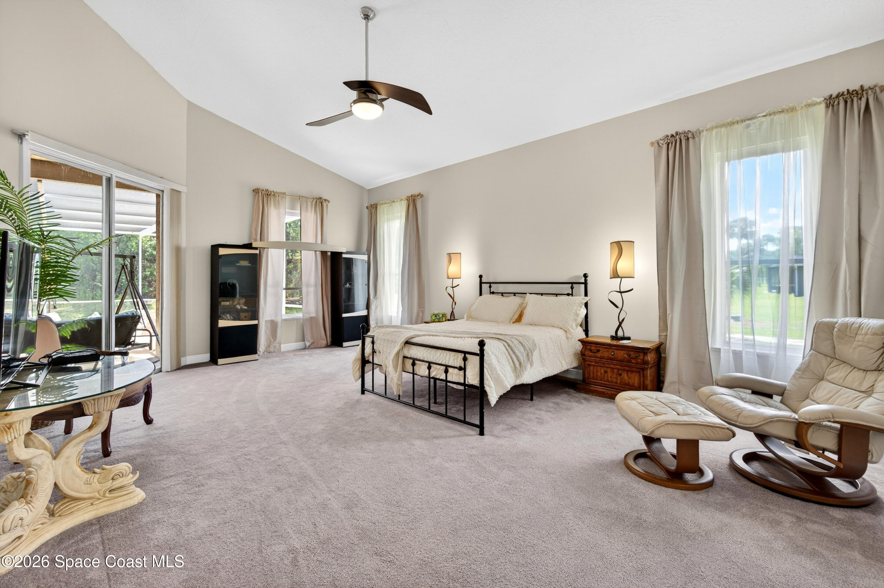 900 Bluegrass Lane Rockledge, FL 32955 - Photo 38 of 73 Primary Suite Opens to Lanai