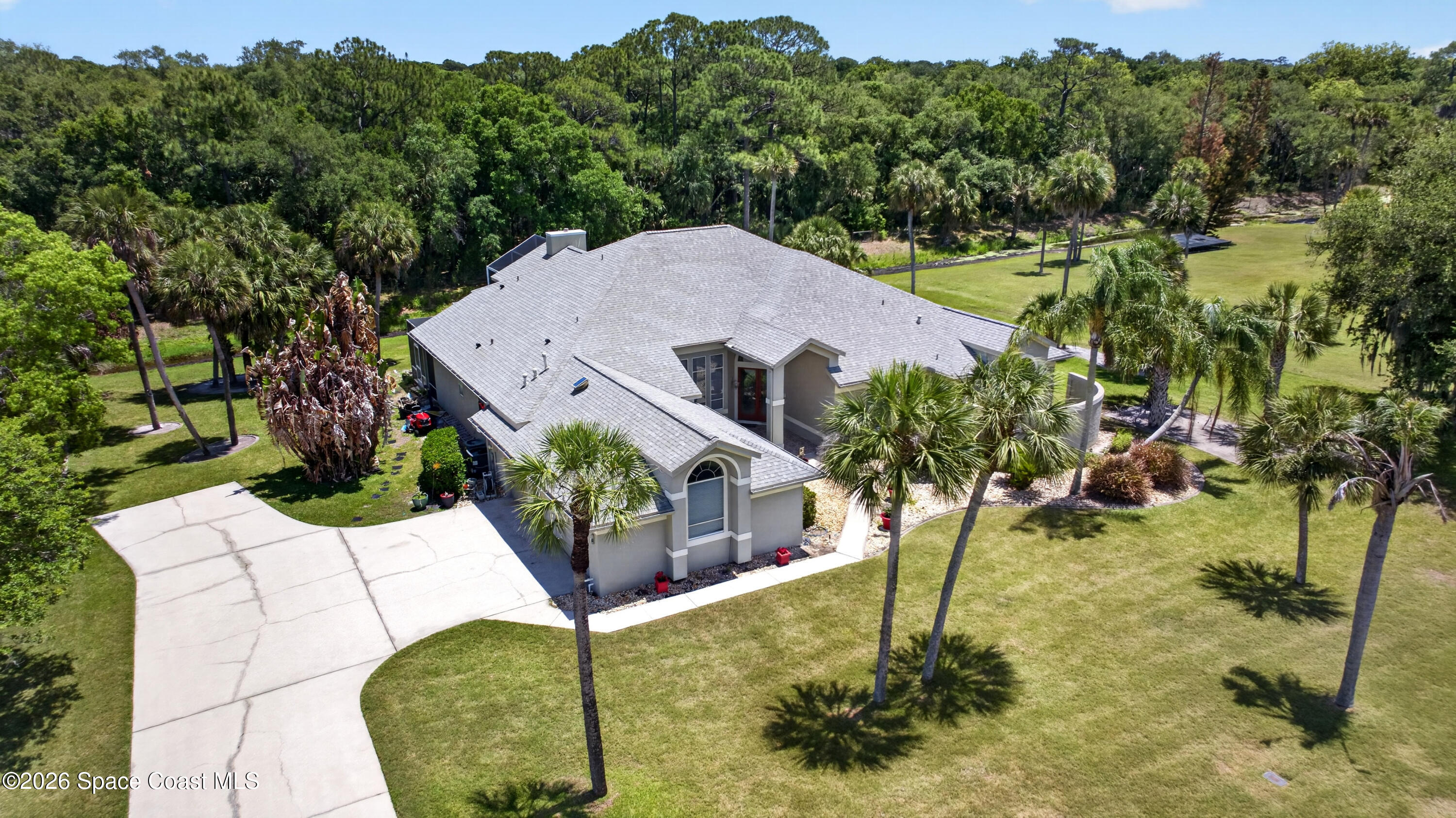 900 Bluegrass Lane Rockledge, FL 32955 - Photo 4 of 73 DJI_20260428140727_0010_D
