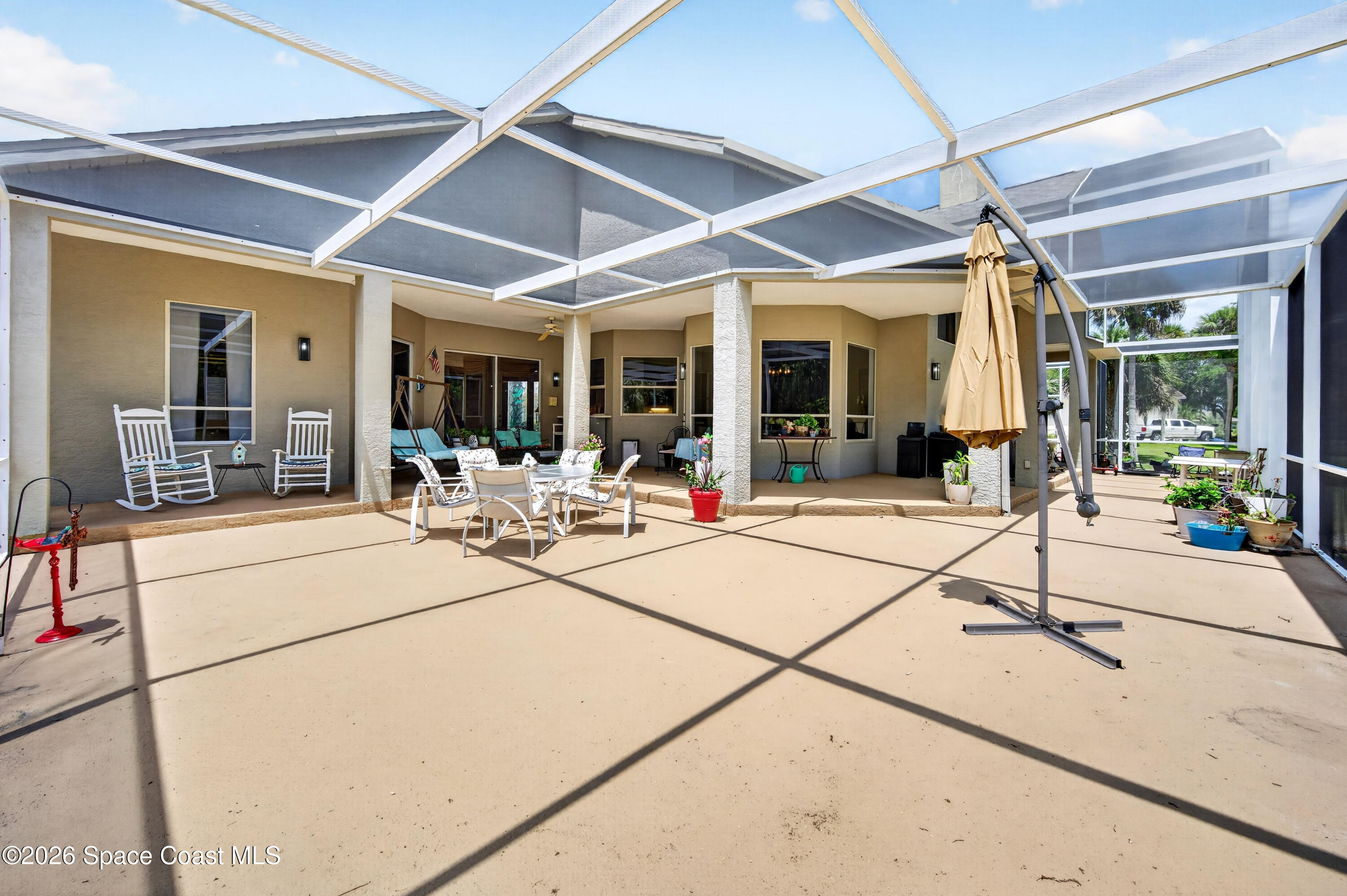 900 Bluegrass Lane Rockledge, FL 32955 - Photo 59 of 73 From Back Right Corner of Lanai