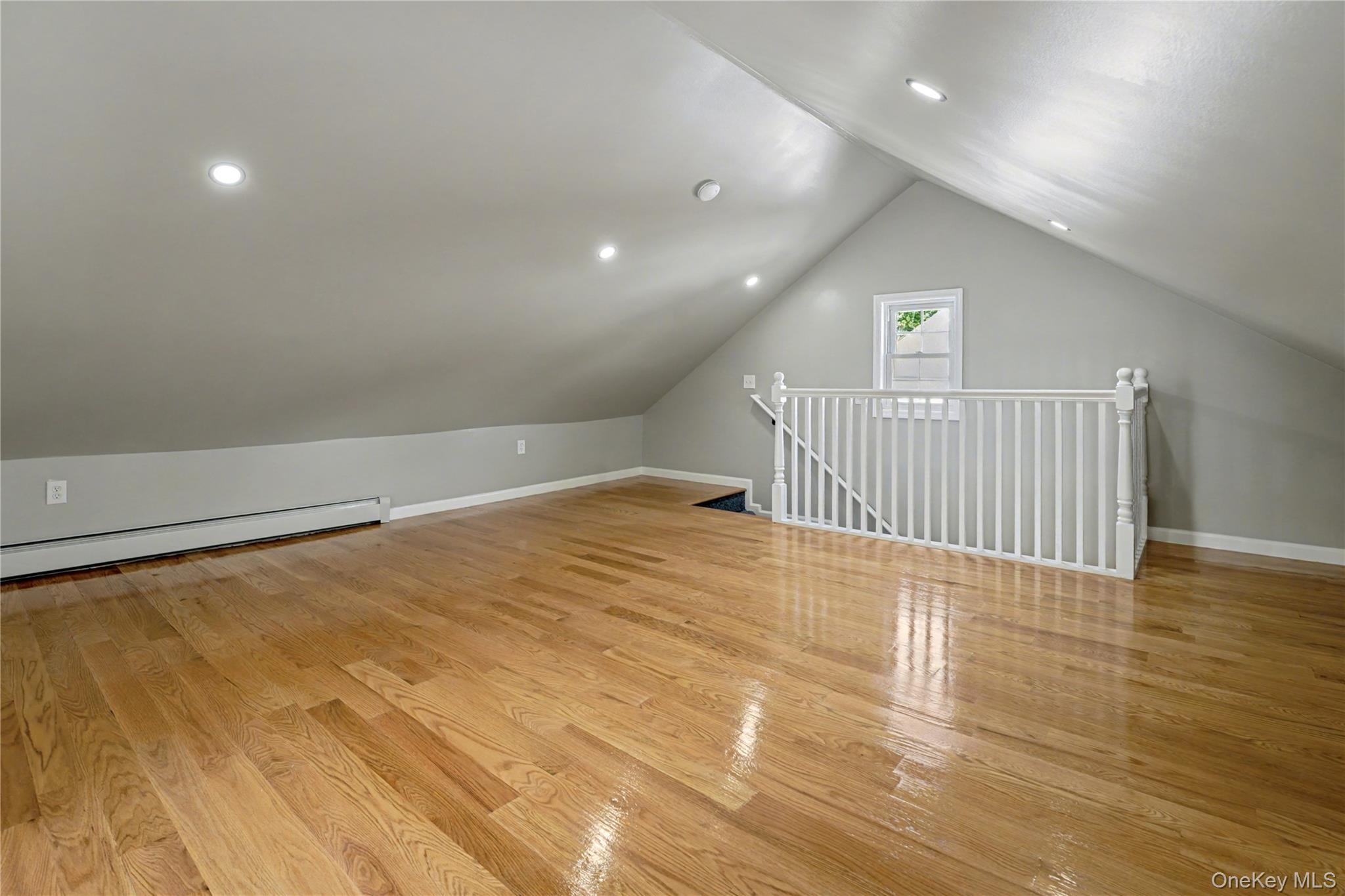 104-40 194th Street Queens, NY 11412 - Photo 12 of 18 a view of a livingroom with wooden floor
