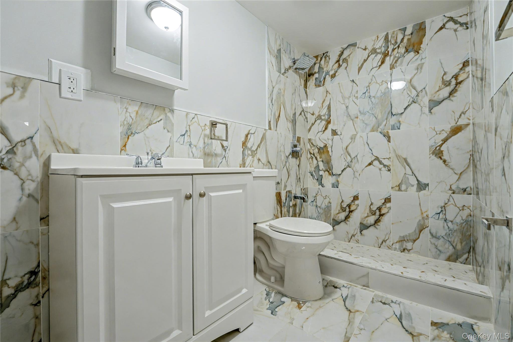 104-40 194th Street Queens, NY 11412 - Photo 13 of 18 a bathroom with a toilet and a sink