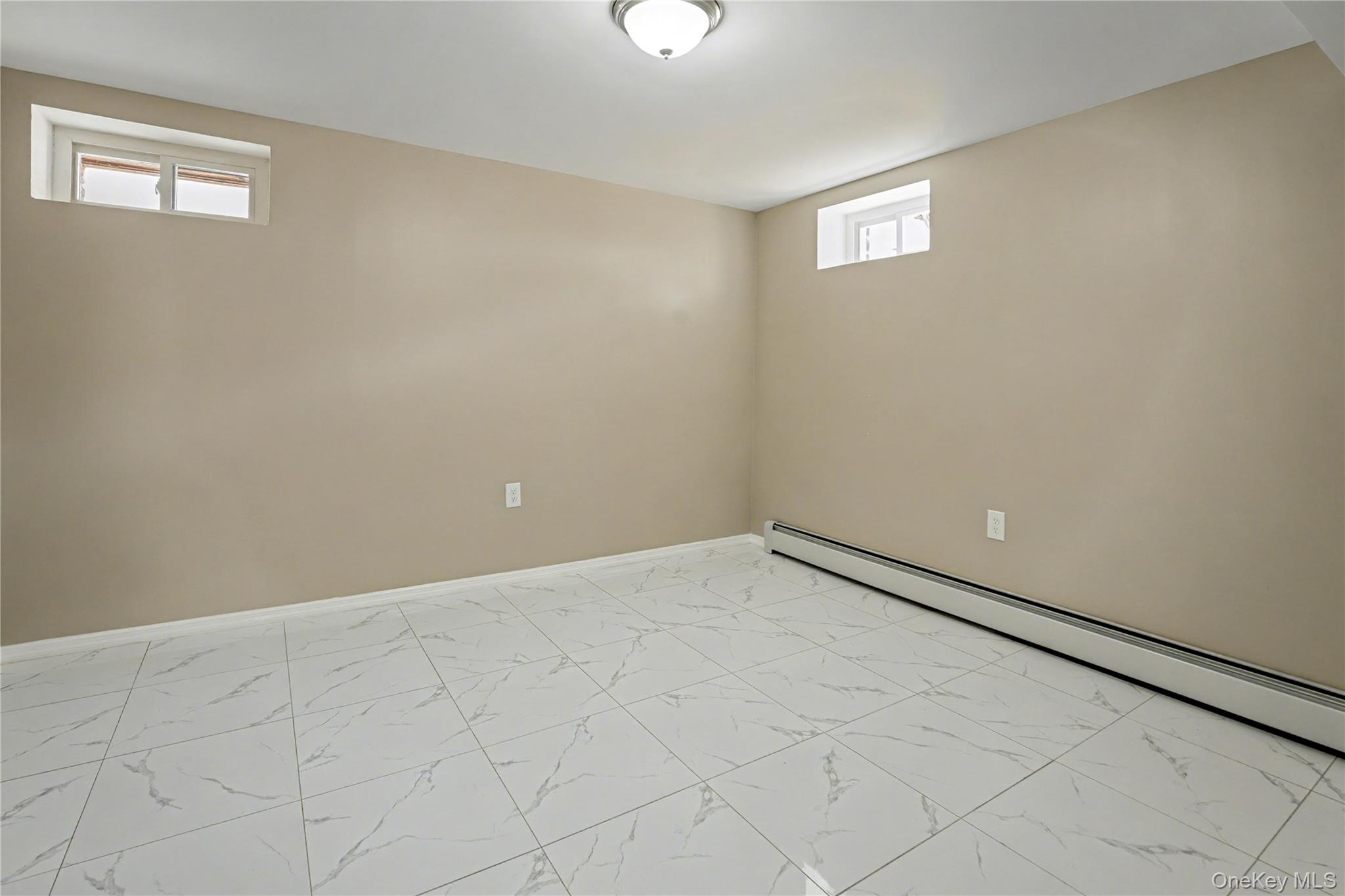 104-40 194th Street Queens, NY 11412 - Photo 15 of 18 a view of an empty room