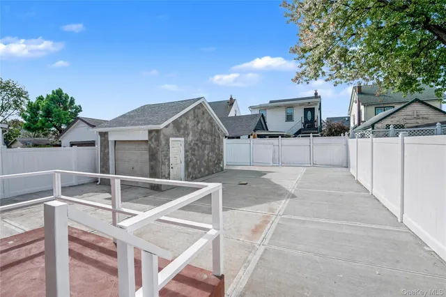 a view of a chairs and table in the patio