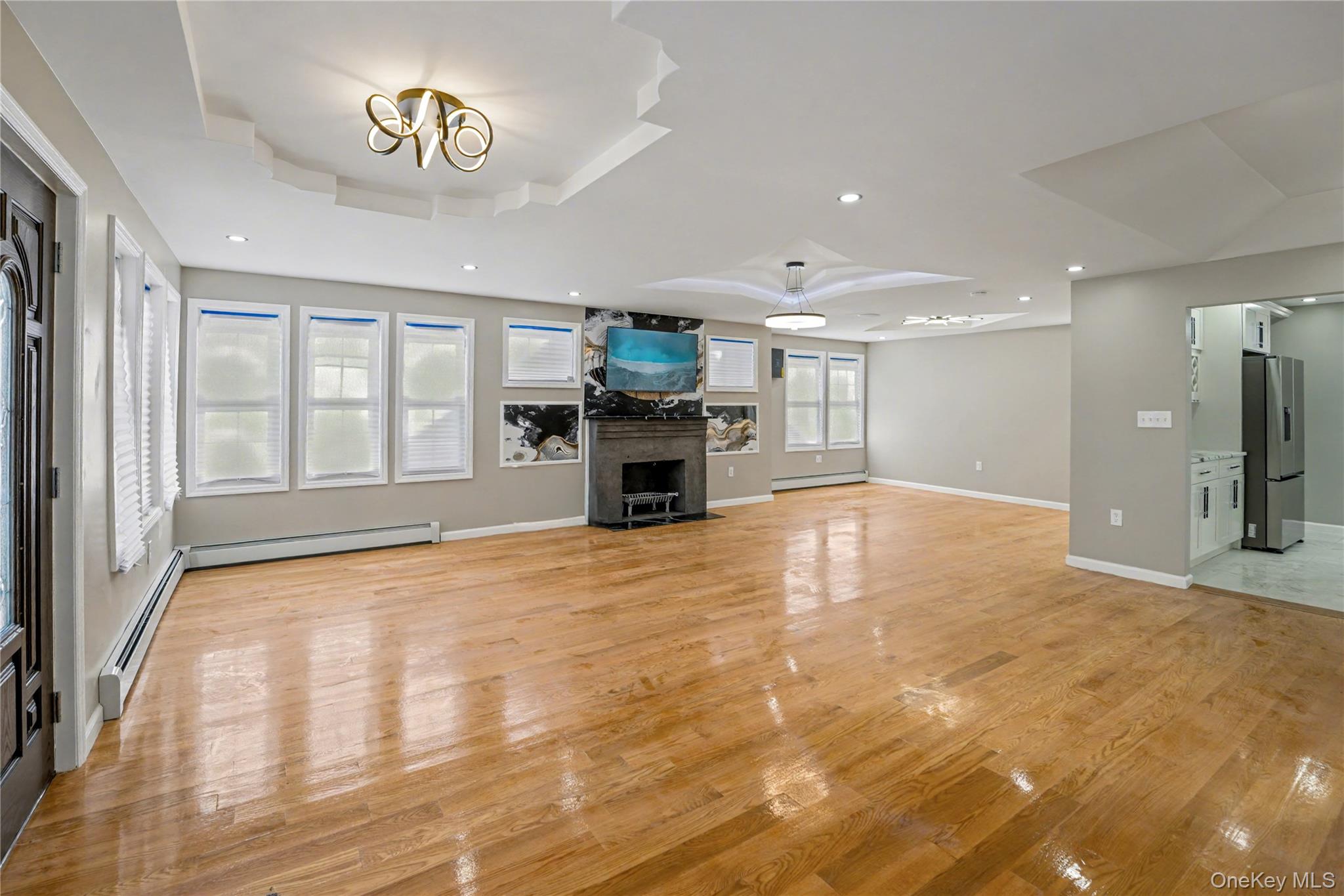 104-40 194th Street Queens, NY 11412 - Photo 4 of 18 a view of a kitchen with a sink and a stove top oven
