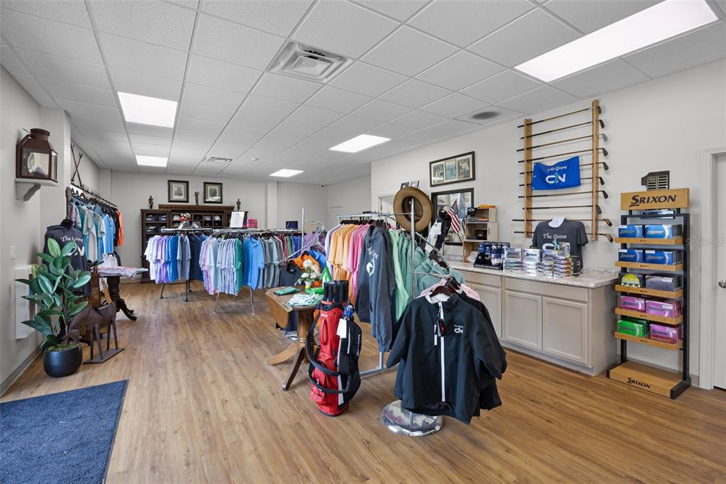 890 Summit Greens Boulevard Clermont, FL 34711 - Photo 60 of 62 a view of a room with gym equipment and wooden floor