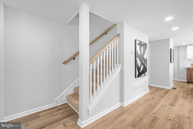 a view of a hallway with staircase