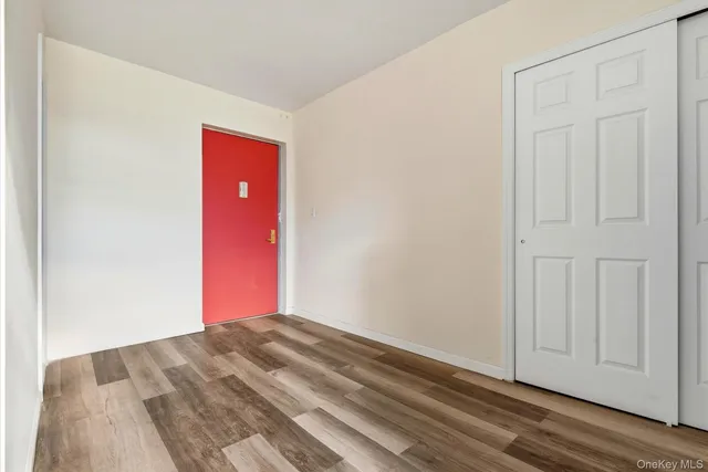 a view of a big room with wooden floor
