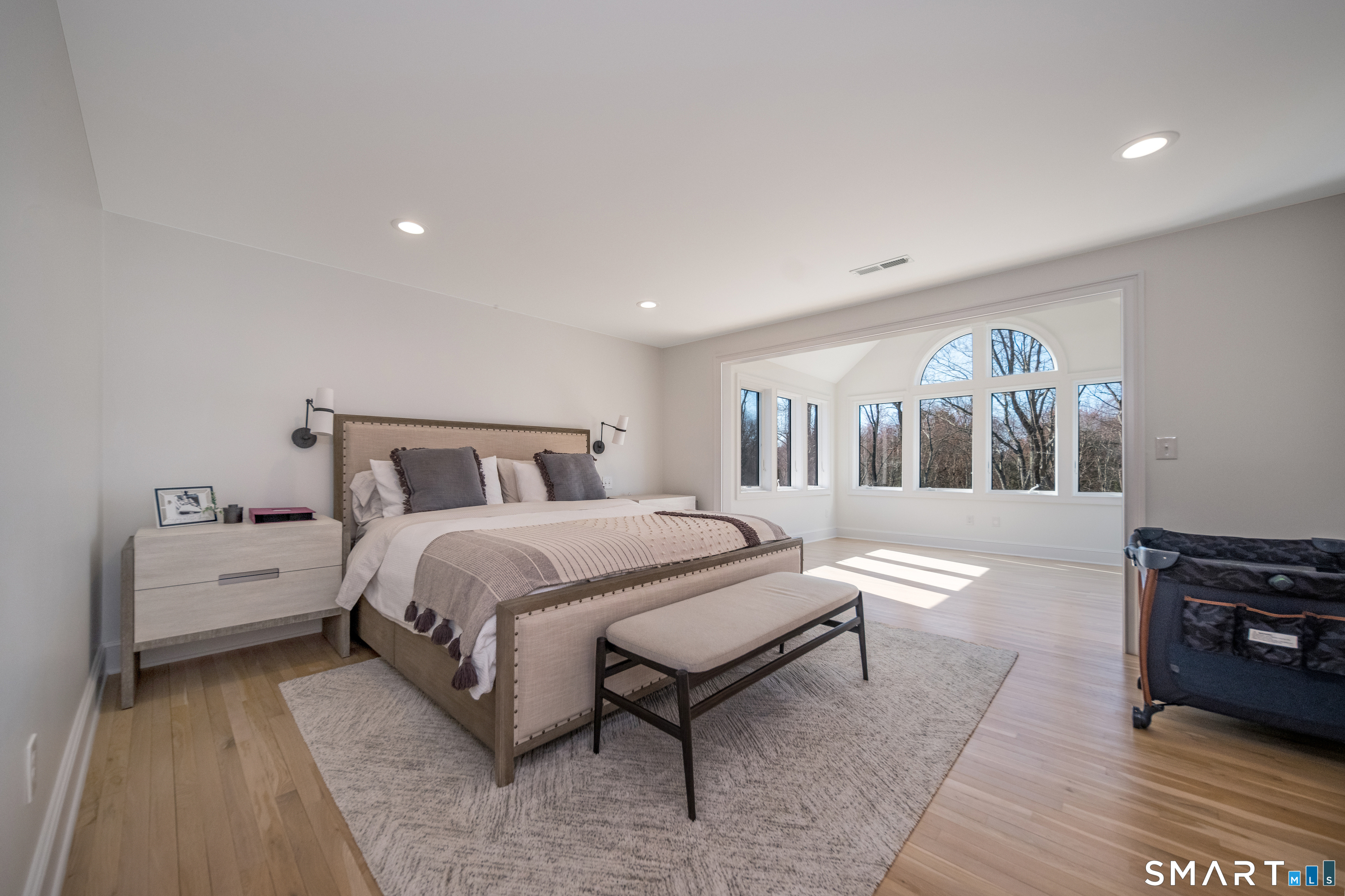45 Island Avenue Madison, CT 06443 - Photo 15 of 38 a bed room with a bed and a couch