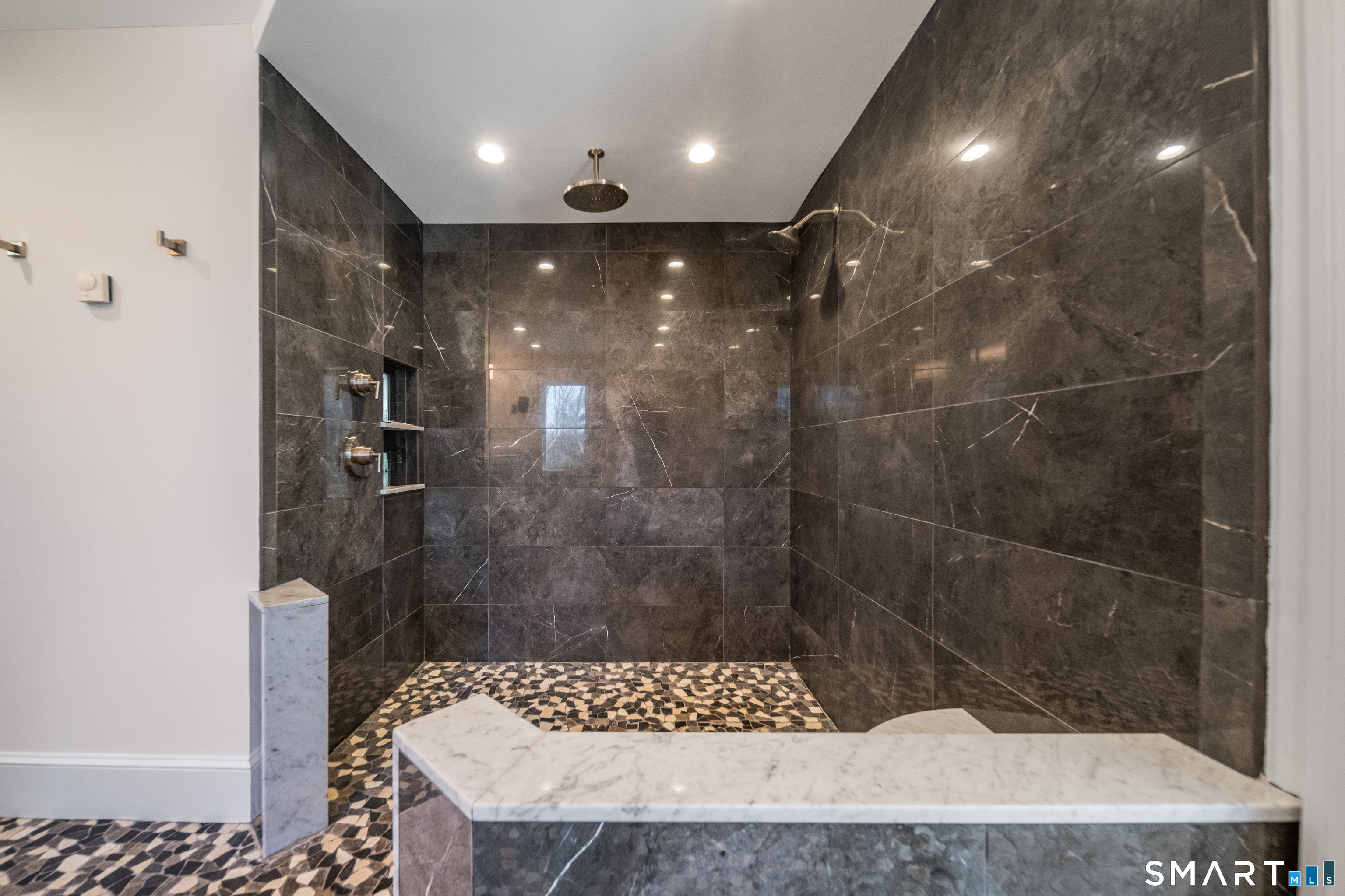 45 Island Avenue Madison, CT 06443 - Photo 18 of 38 a bathroom with a shower