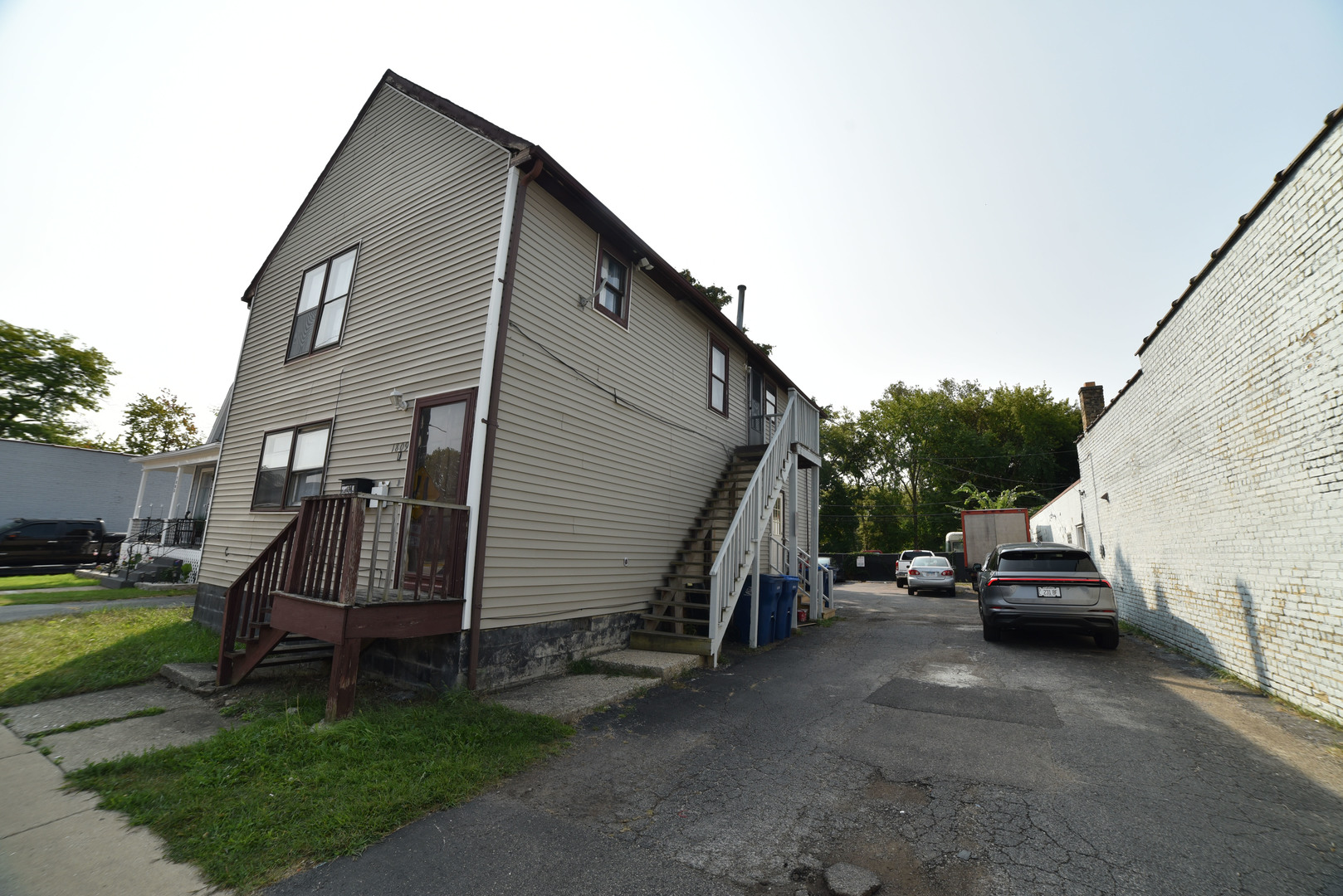 1809 Washington Street Waukegan, IL 60085 - Photo 2 of 16 a view of a house with a back yard
