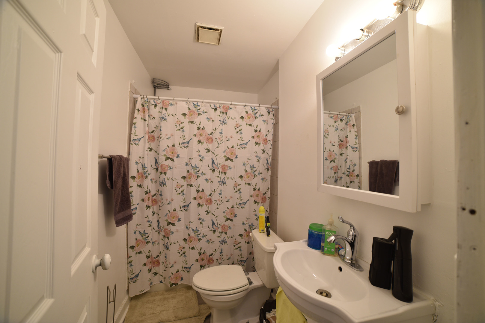 1809 Washington Street Waukegan, IL 60085 - Photo 6 of 16 a bathroom with a sink toilet and shower