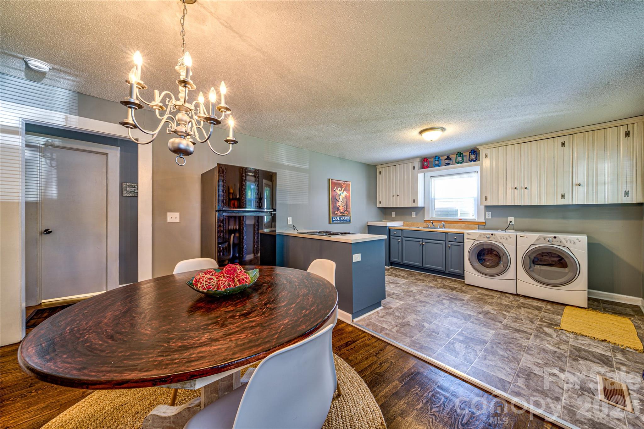 308 South Myrtle School Road Gastonia, NC 28052 - Photo 13 of 22 a view of a dining room with furniture and chandelier