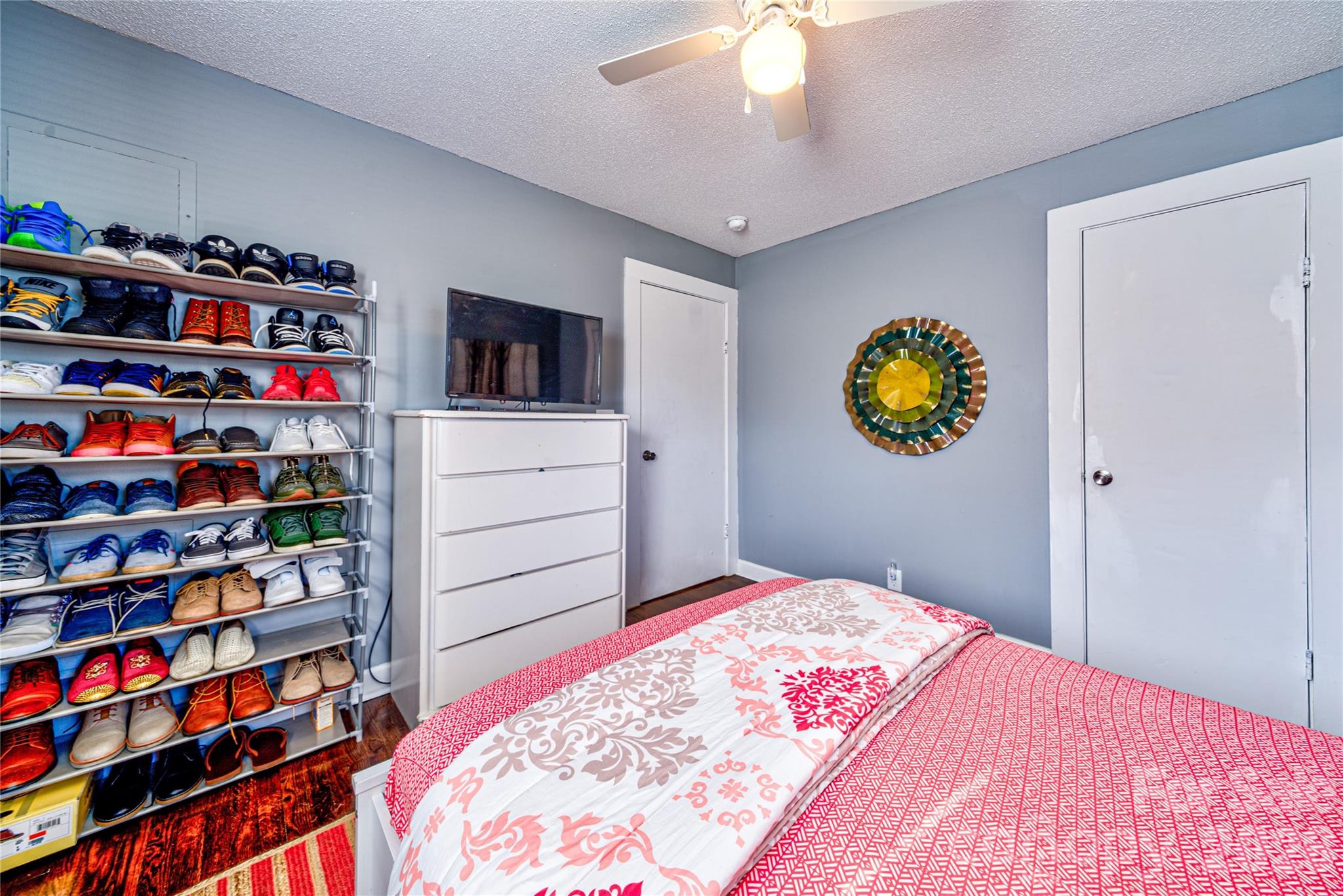 308 South Myrtle School Road Gastonia, NC 28052 - Photo 16 of 22 a bedroom with a bed and a book shelf