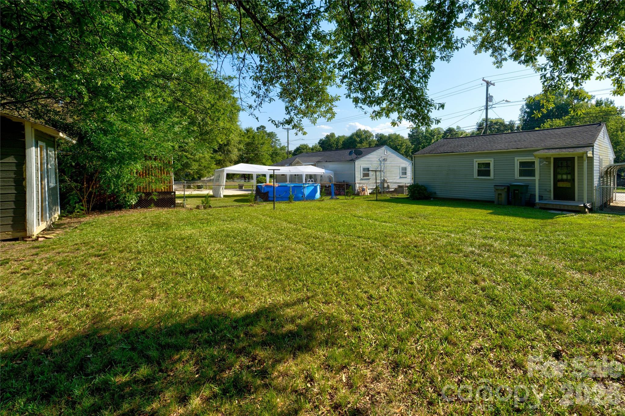 308 South Myrtle School Road Gastonia, NC 28052 - Photo 21 of 22 a house view with a sitting space and garden