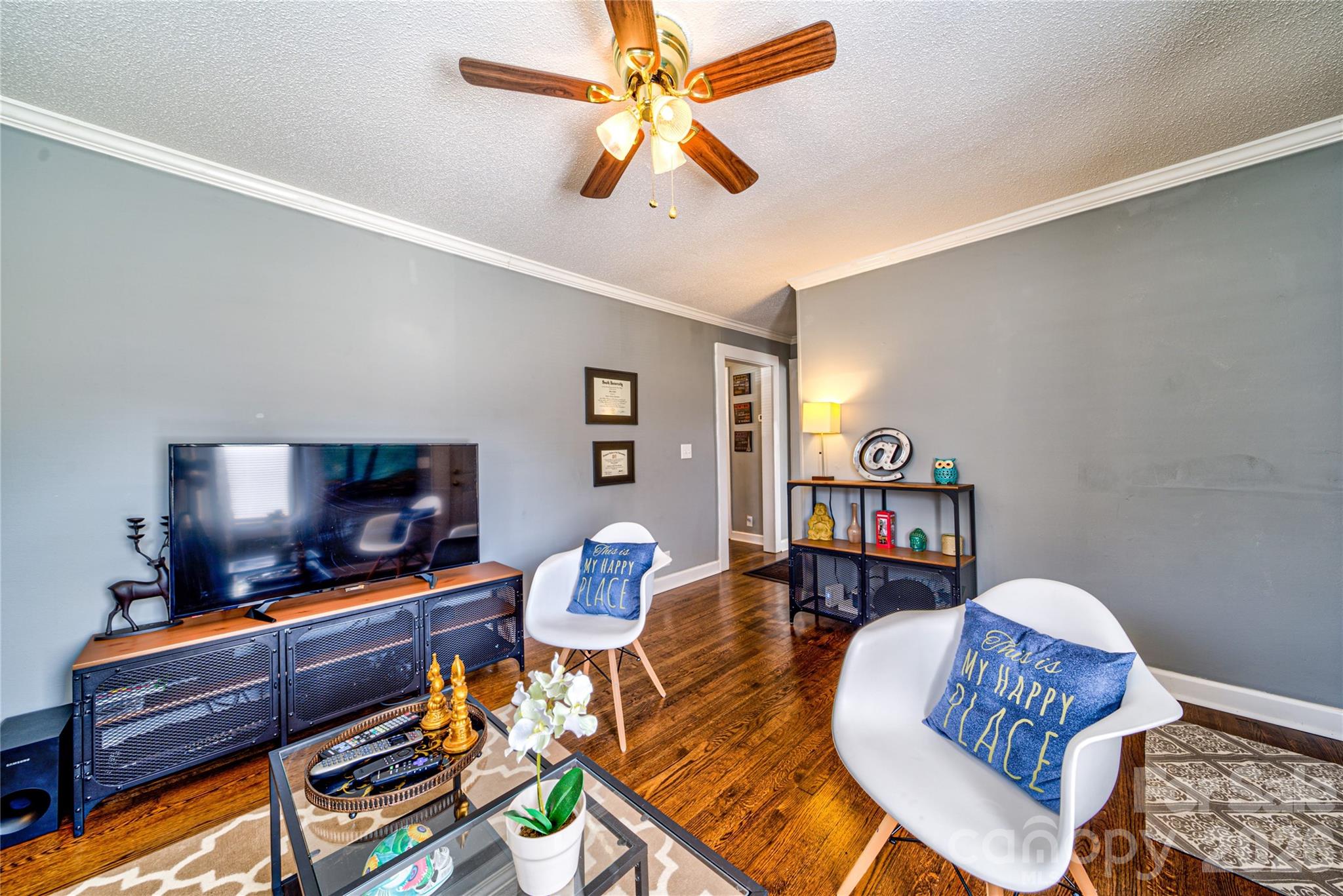 308 South Myrtle School Road Gastonia, NC 28052 - Photo 5 of 22 a living room with furniture and a flat screen tv