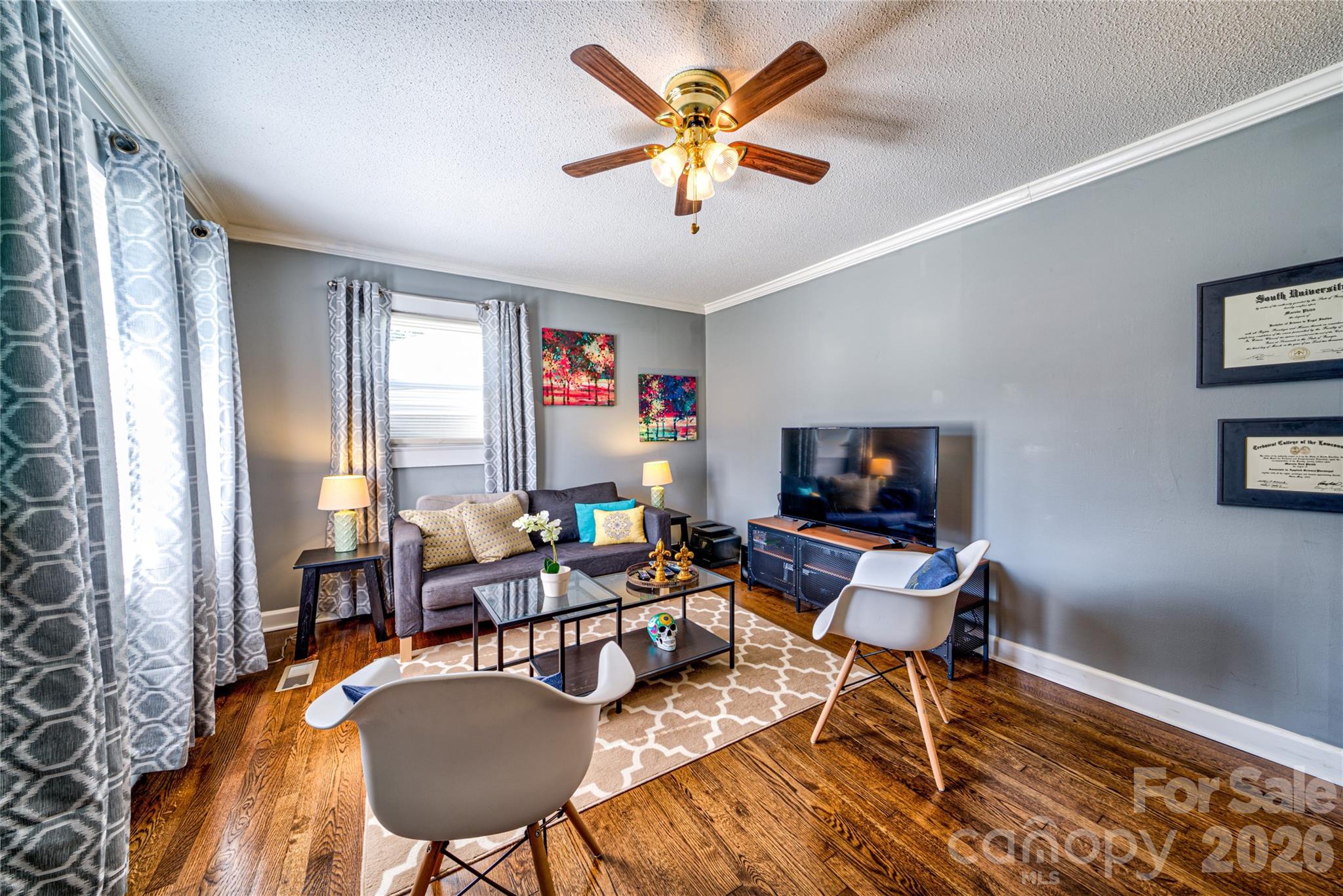 308 South Myrtle School Road Gastonia, NC 28052 - Photo 6 of 22 a living room with furniture and a flat screen tv