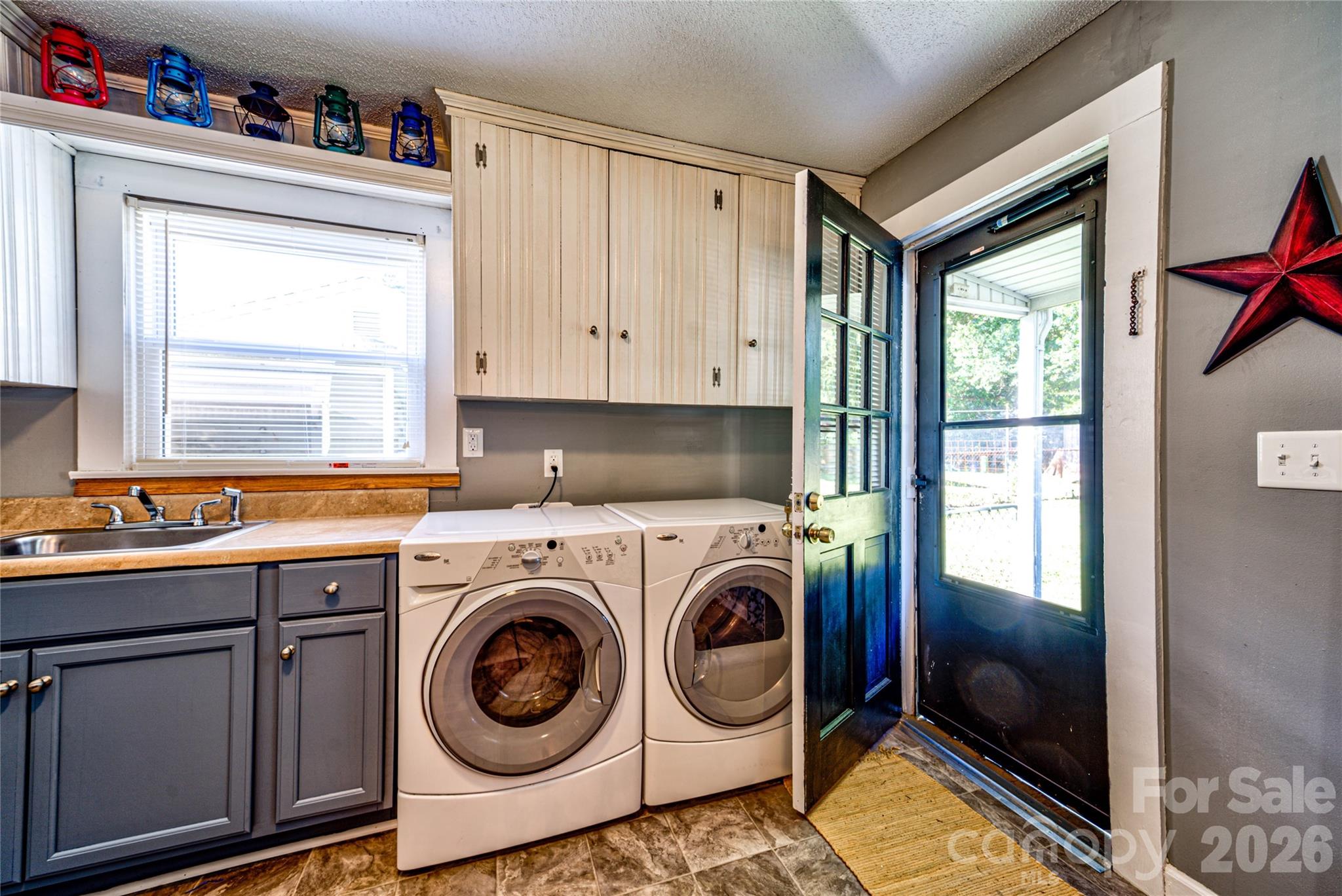 308 South Myrtle School Road Gastonia, NC 28052 - Photo 10 of 22 a utility room with sink dryer and washer