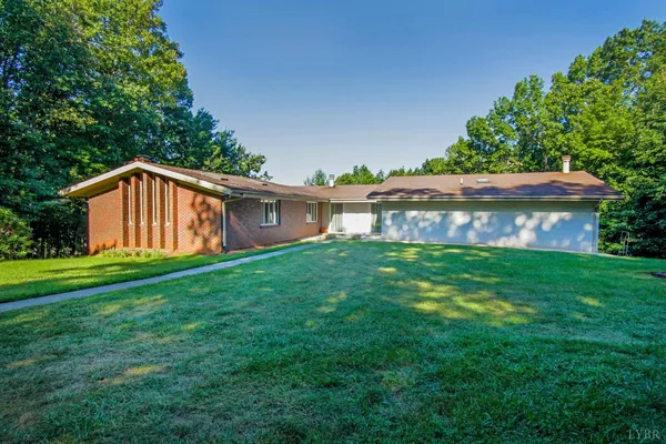 a view of a backyard with a garden