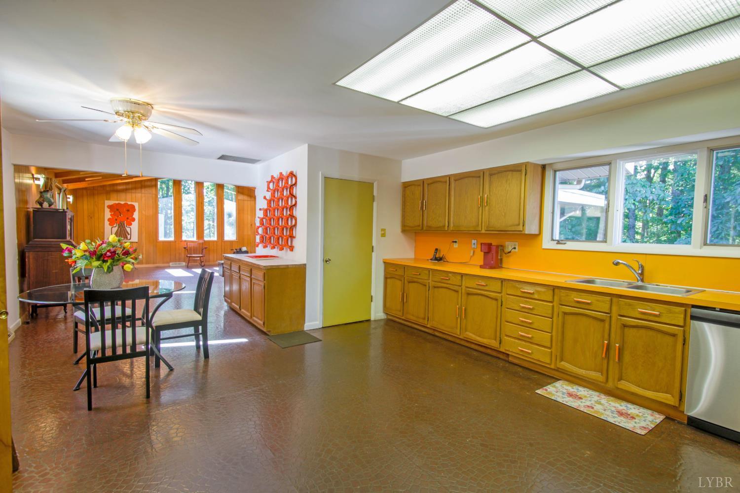 151 Clarks Road Rustburg, VA 24588 - Photo 14 of 81 a kitchen with lots of counter top space and dining table