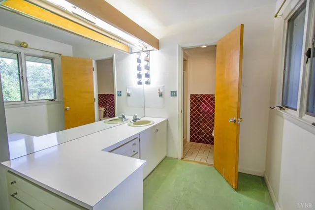 a bathroom with a toilet and a sink