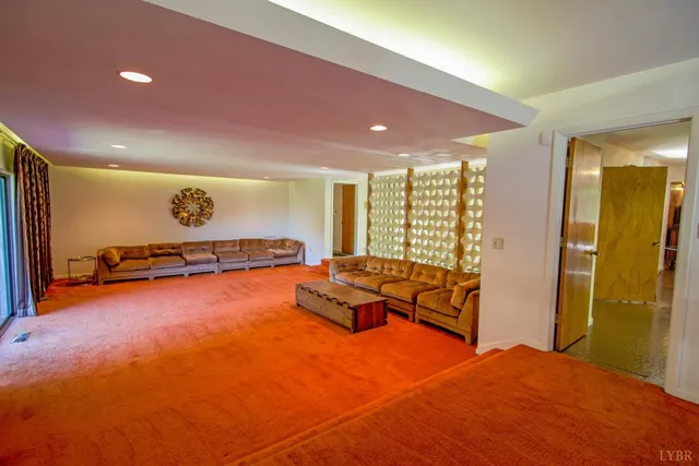 a kitchen with lots of counter top space and dining table