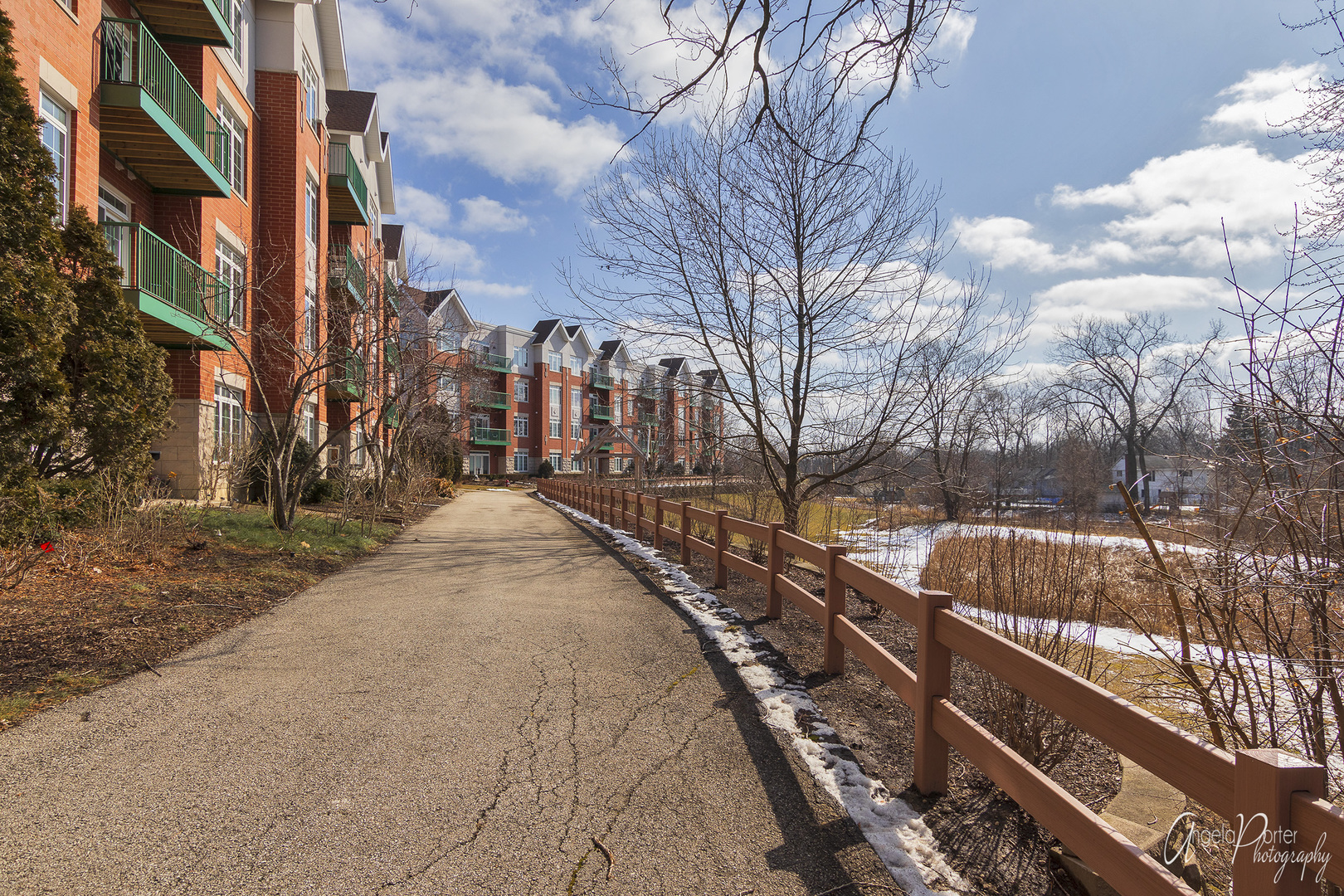 640 McHenry Road, Unit 301 Wheeling, IL 60090 - Photo 3 of 9 a view of city street with a building