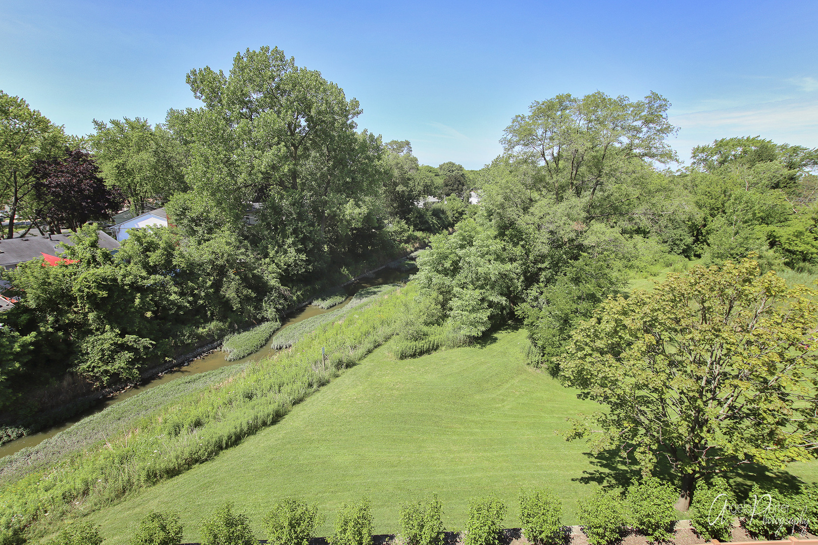 640 McHenry Road, Unit 301 Wheeling, IL 60090 - Photo 7 of 9 a view of a large yard with lots of green space