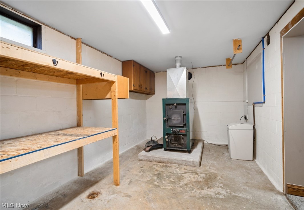 9 Short Brook Road Vincent, OH 45784 - Photo 17 of 21 26x10 storage room with wood stove