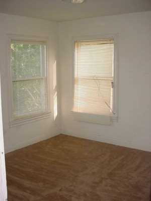 2913 Waldron Road Corpus Christi, TX 78418 - Photo 4 of 8 an empty room with a window