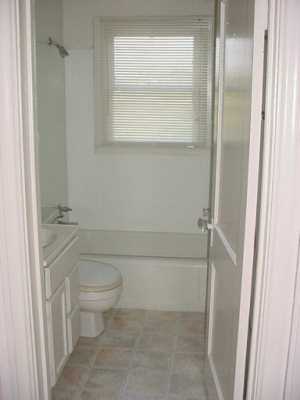 2913 Waldron Road Corpus Christi, TX 78418 - Photo 6 of 8 a bathroom with a toilet and a shower