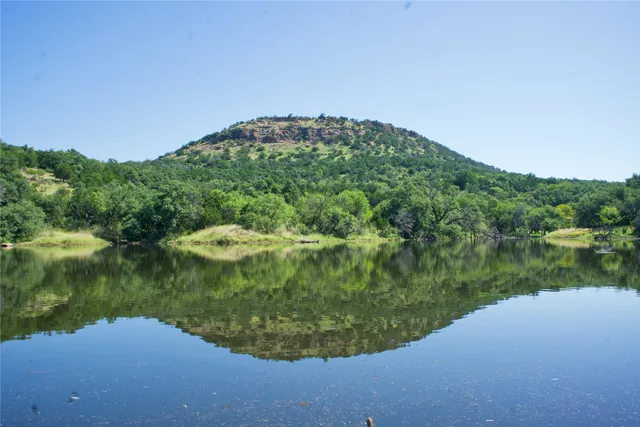 a view of a lake from a balcony
