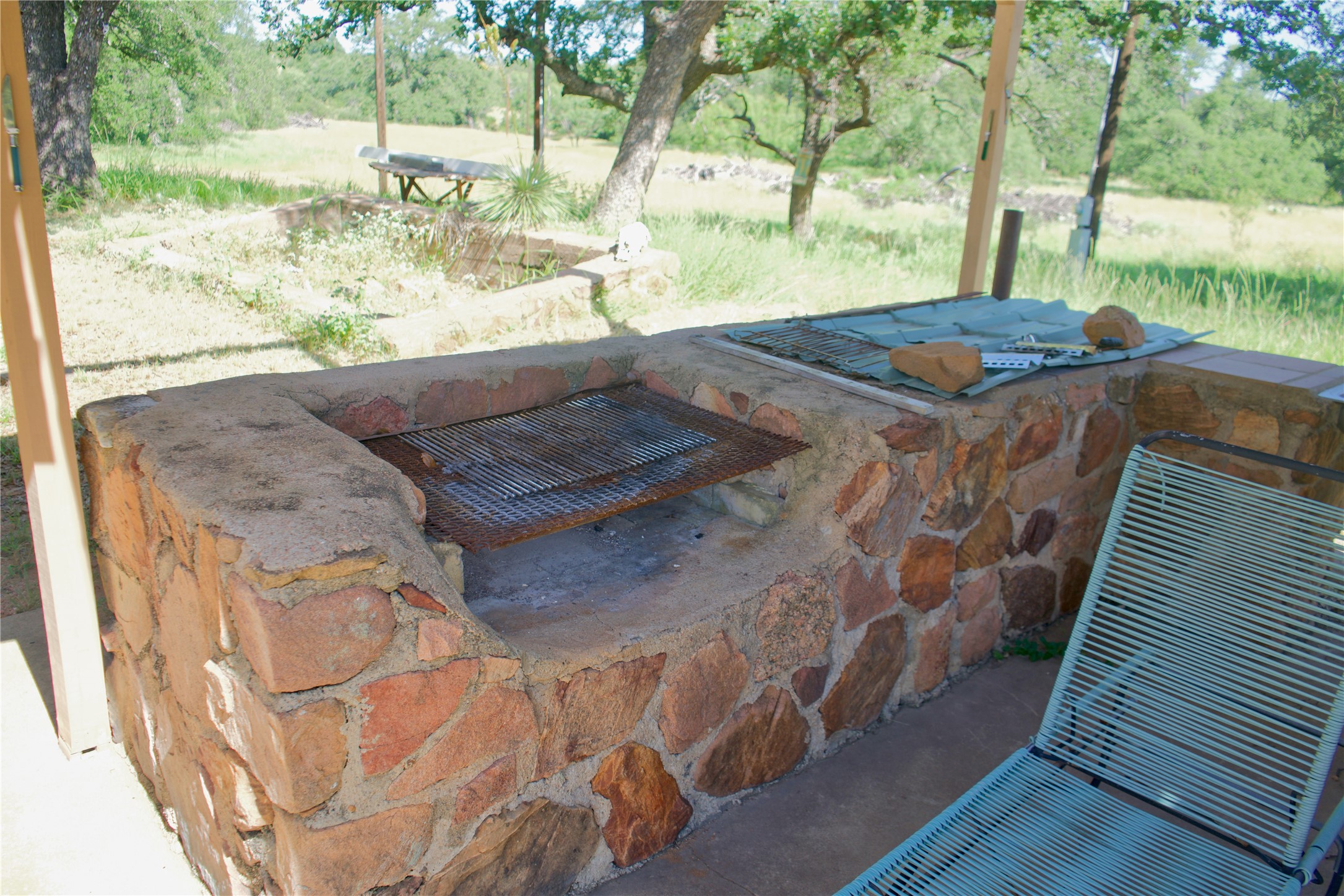585 Hickory Spring Road Willow City, TX 78675 - Photo 15 of 25 a view of a yard with an outdoor space