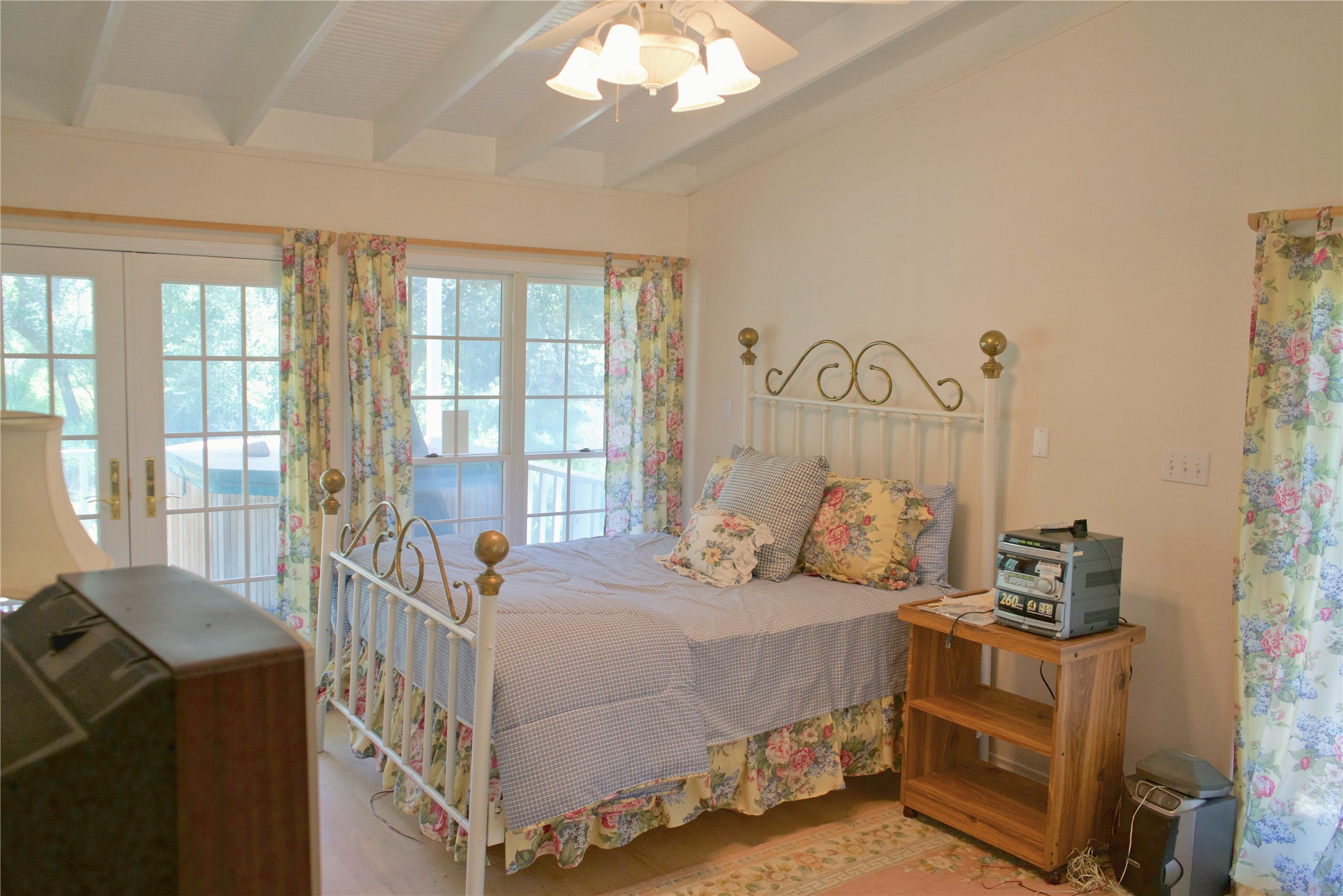 585 Hickory Spring Road Willow City, TX 78675 - Photo 22 of 25 a bedroom with a bed and a window