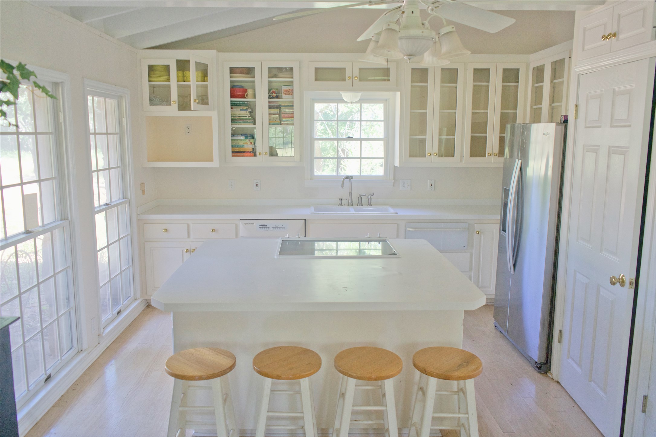 585 Hickory Spring Road Willow City, TX 78675 - Photo 25 of 25 a view of open kitchen with windows