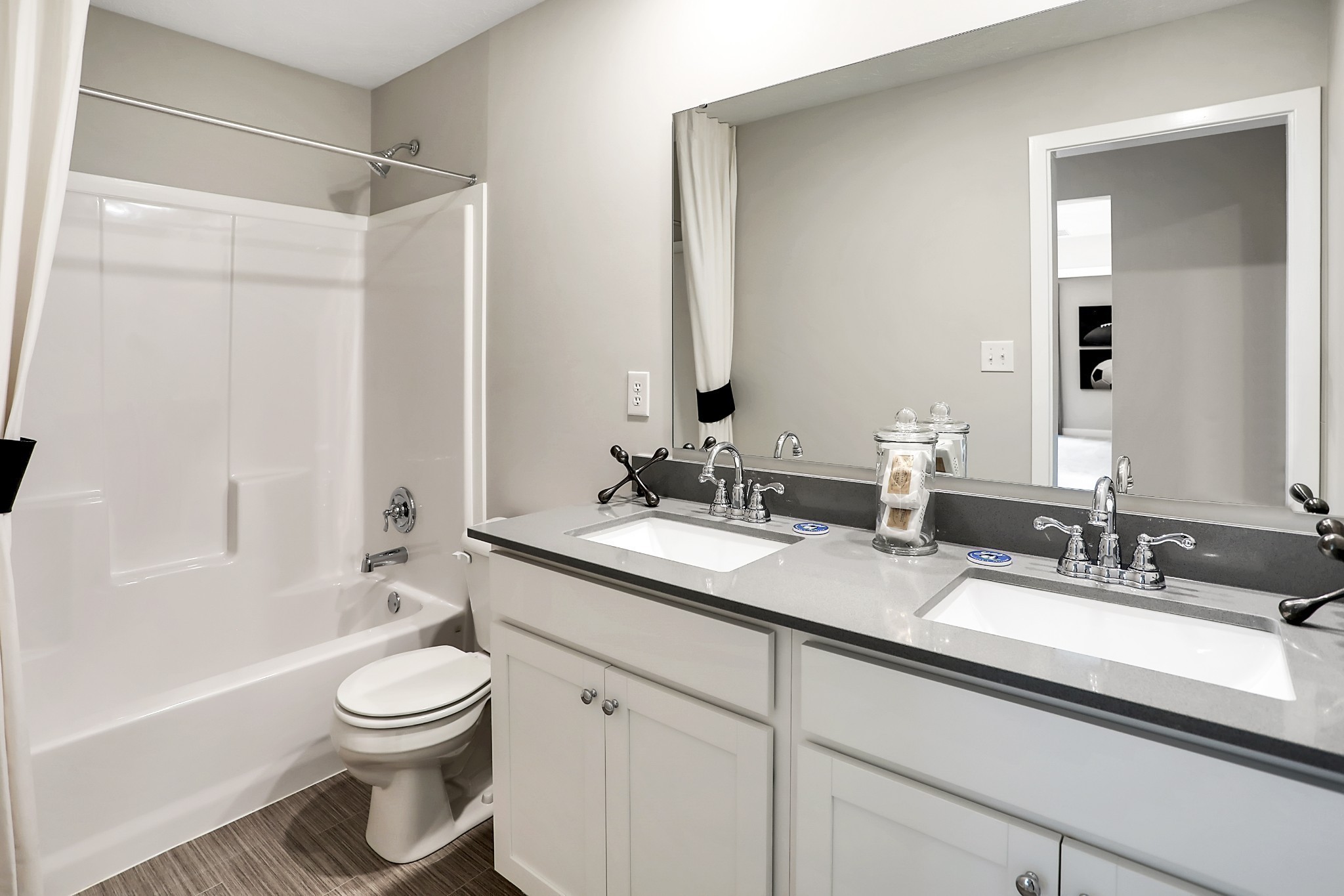 209 Goldfinch Rd Mount Mount Juliet, TN 37122 - Photo 13 of 14 a bathroom with a double vanity sink toilet and shower