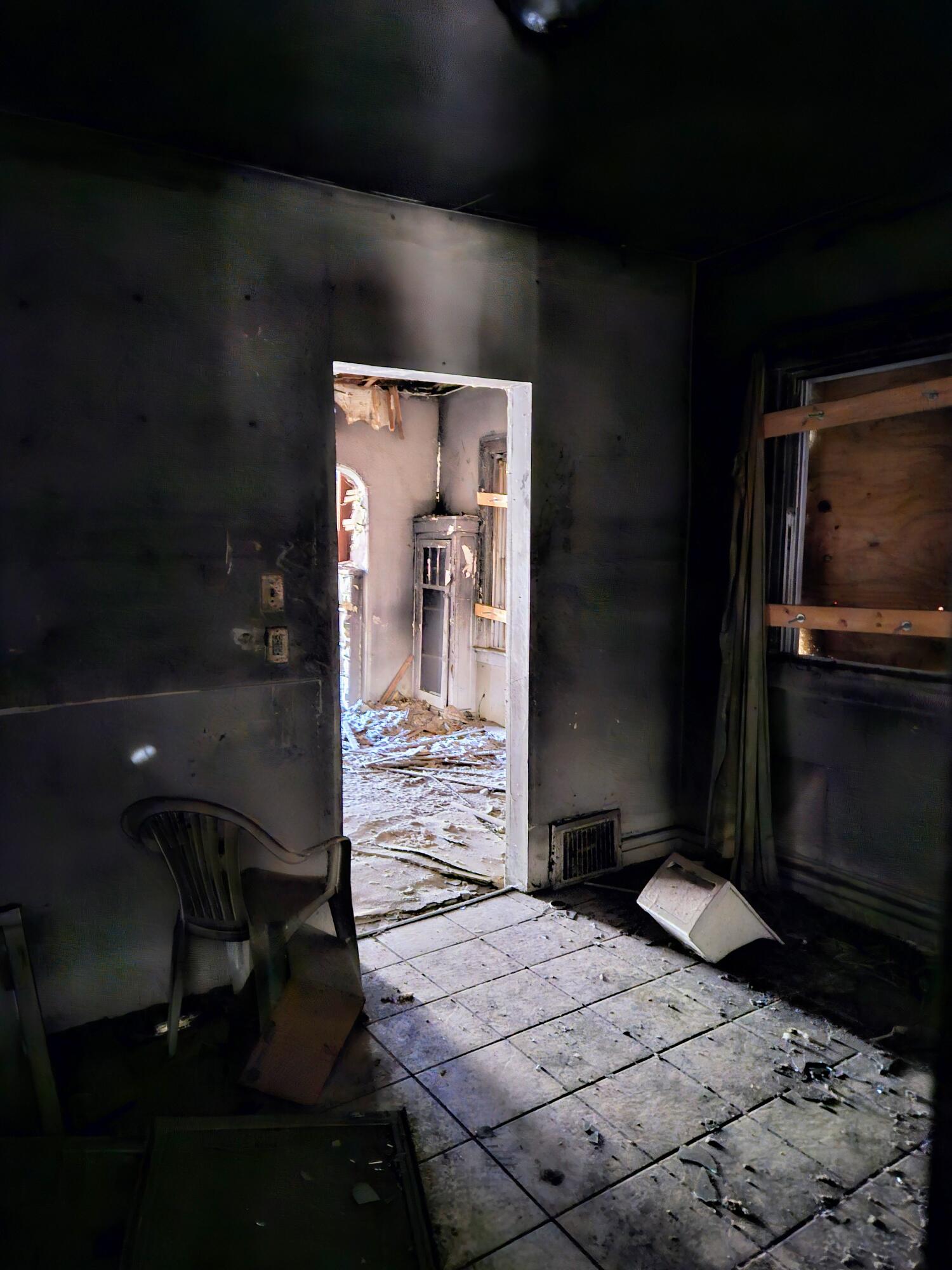 3992 Madison Street Gary, IN 46408 - Photo 10 of 11 a hallway with a view of living room