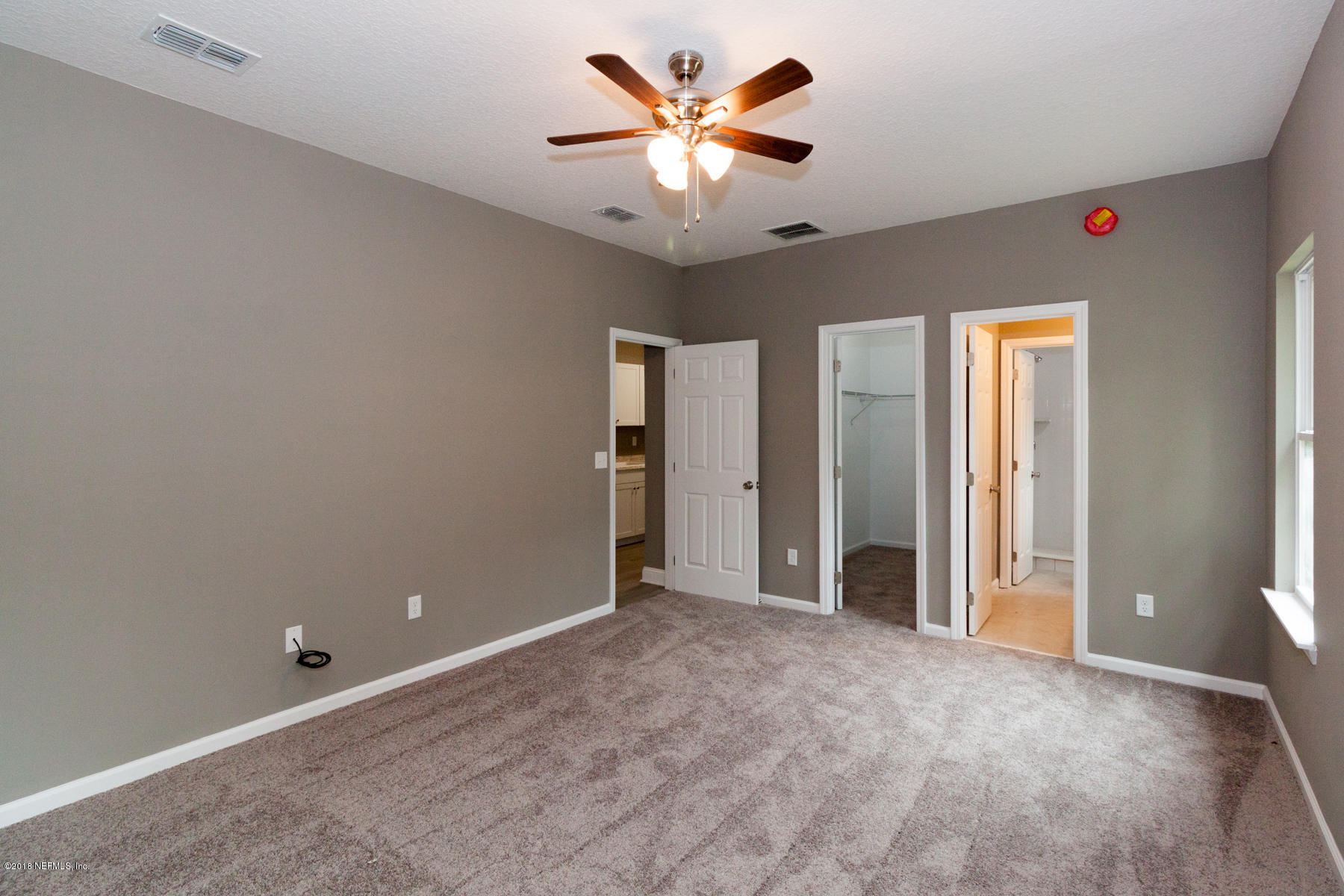 12879 Beaubien Road Jacksonville, FL 32258 - Photo 16 of 28 a view of an empty room with a window