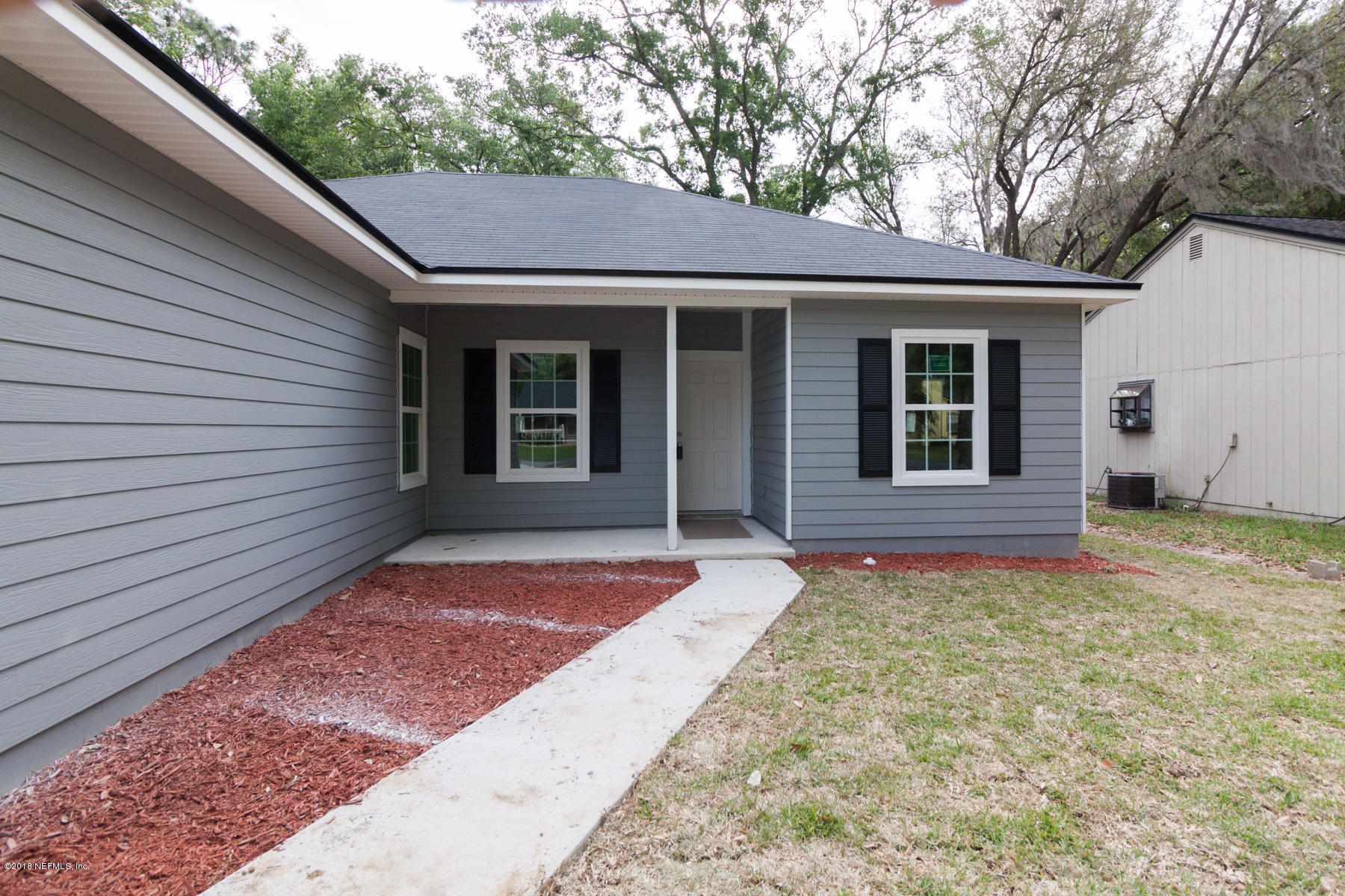 12879 Beaubien Road Jacksonville, FL 32258 - Photo 3 of 28 a view of a house with a yard